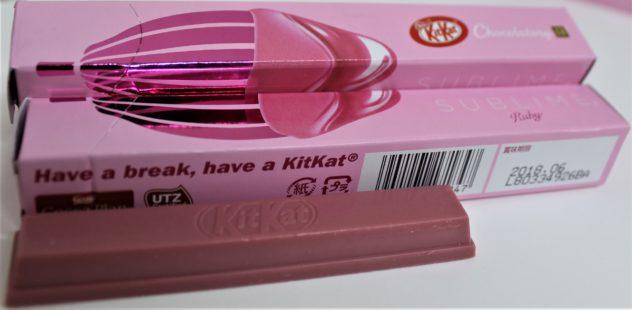 New picture ruby chocolate unwrapped with packaging in the back