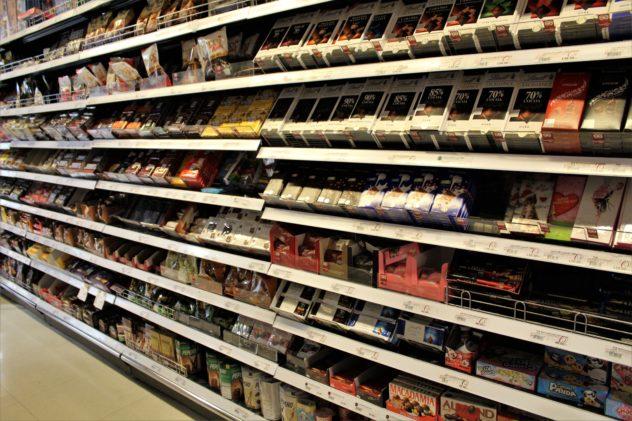 The chocolate aisle in a premium grocery store in Bangkok, Thailand, with imported European chocolate in the forefront
