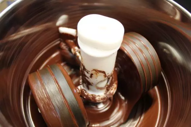 Refining Venezuelan chocolate in a grinder