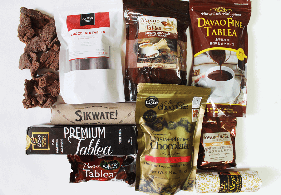 Various brands of cacao nibs and tableya displayed, showcasing options for making healthy cacao nibs recipes.