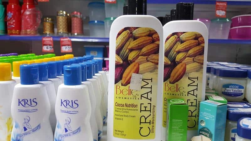 bottles of cocoa butter lotion in a pharmacy aisle in Fiji.