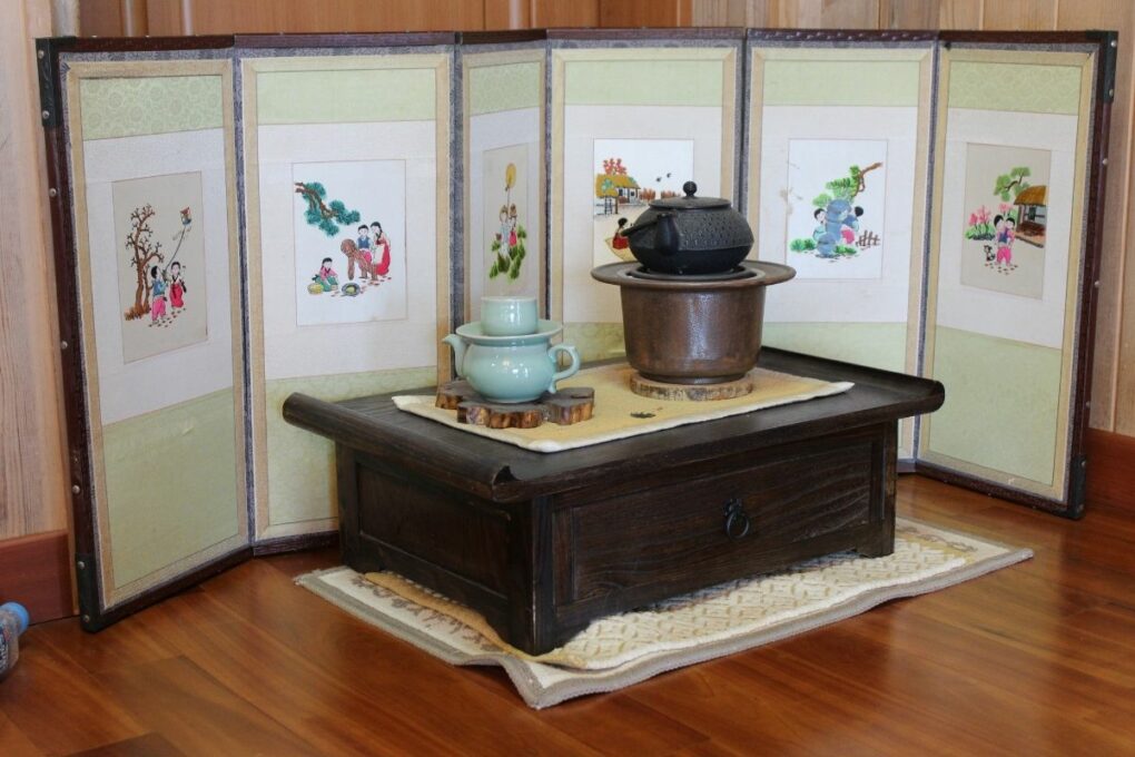 Korean teapot artifacts in a museum.