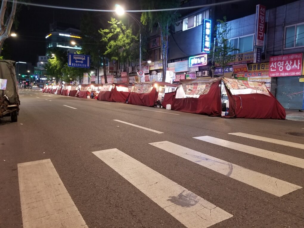 Street food stalls in Korea during evening.