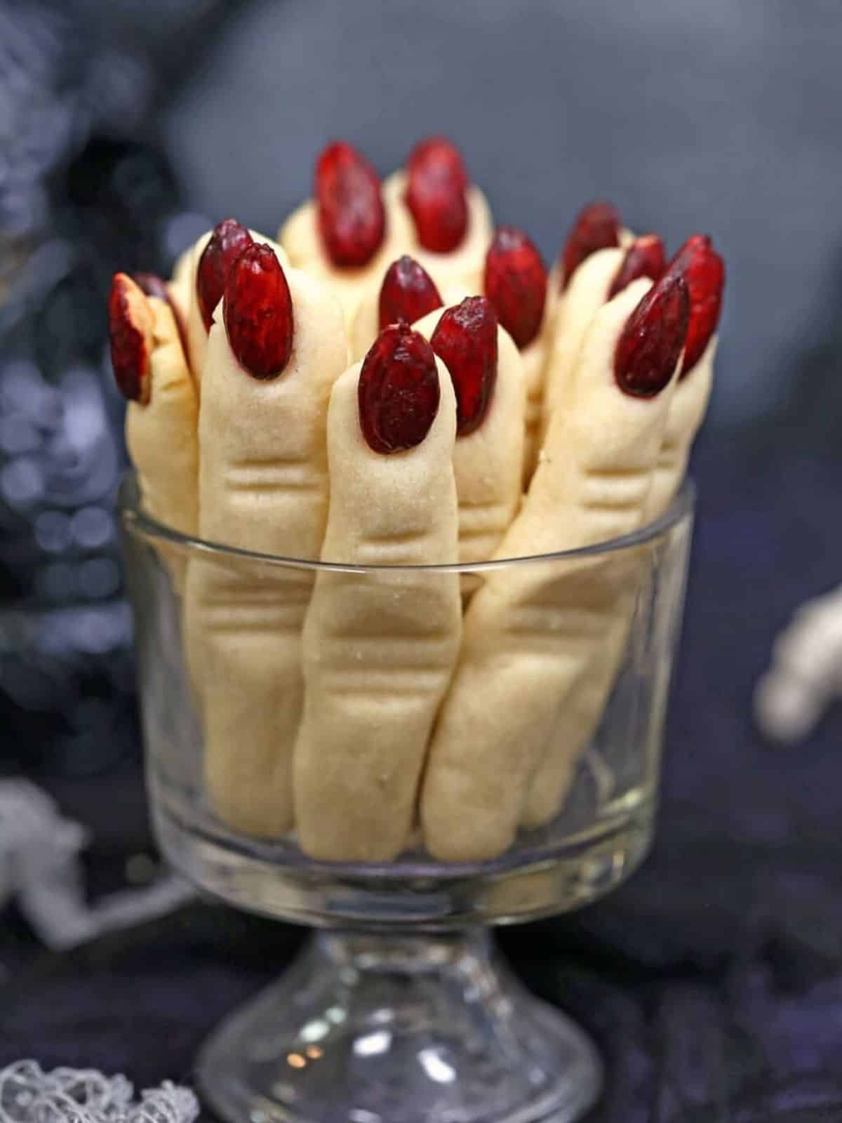 Witch Finger Cookies in a glass cup. 