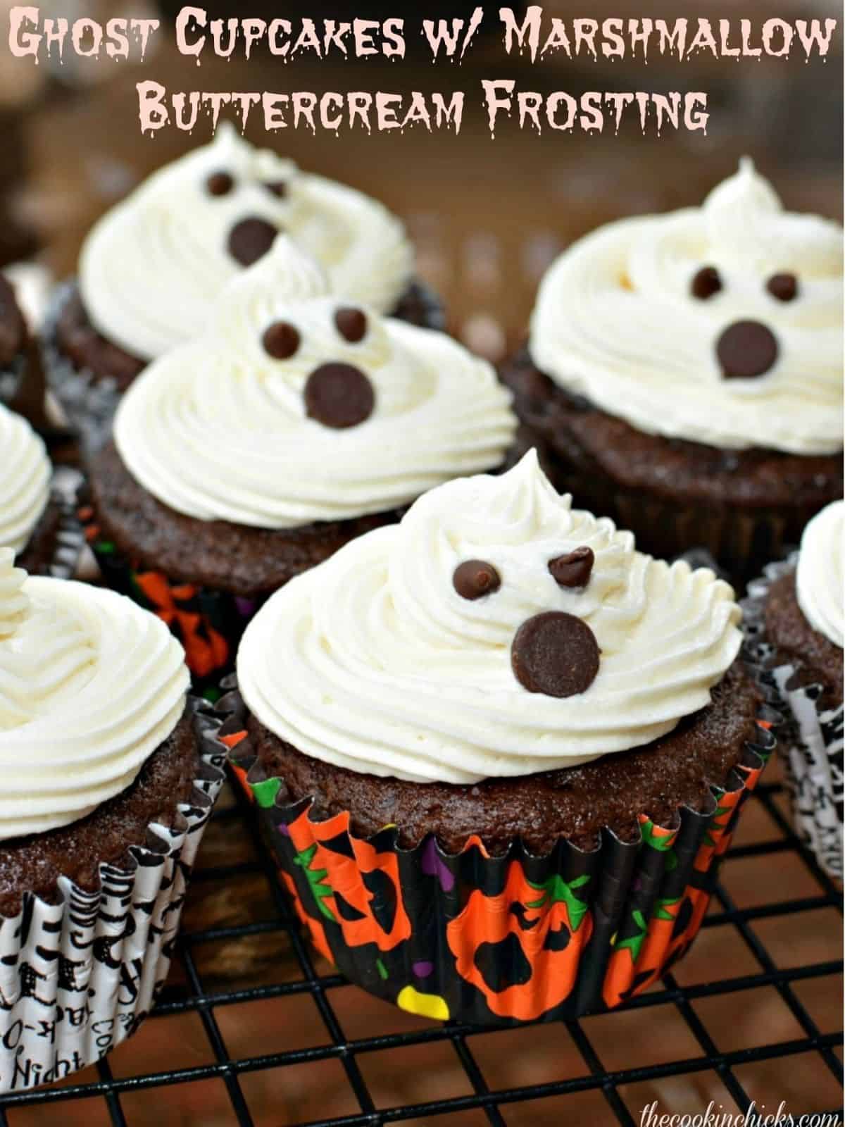 Ghost themed marshmallow cupcakes with buttercream frosting.