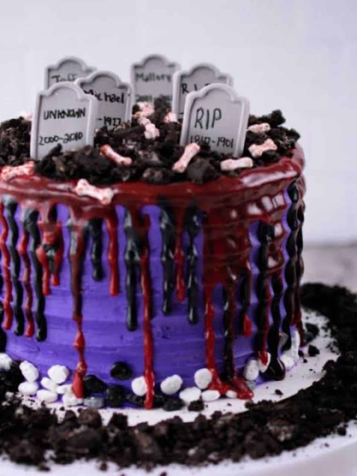 Ghost Graveyard Cake decorated with spooky ghosts and tombstones, perfect for Halloween.