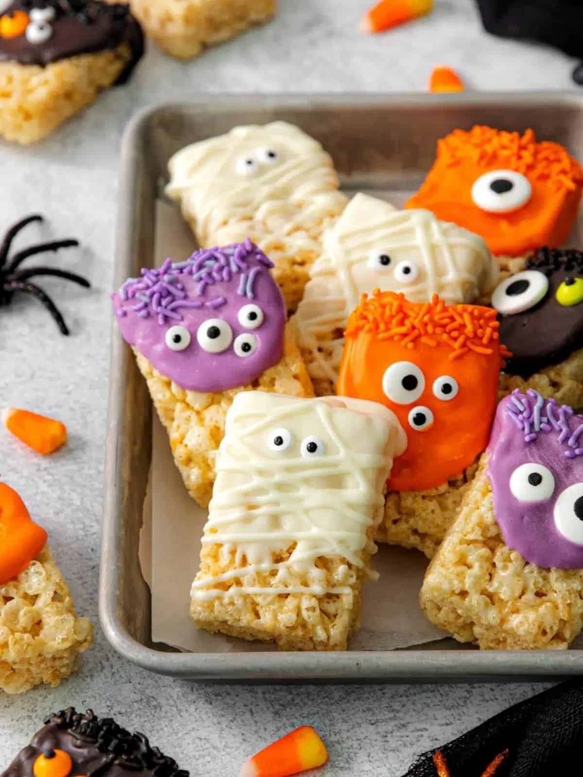 Halloween Rice Krispies Treats decorated with Halloween-themed sprinkles, perfect for Halloween dessert ideas and festive celebrations.