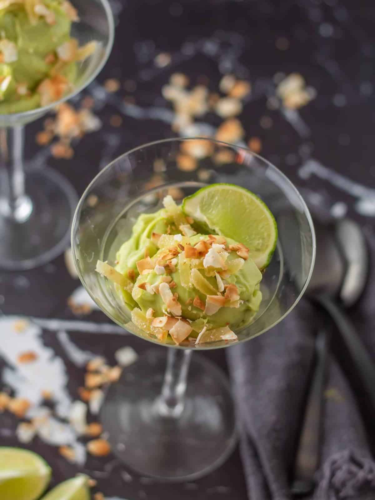 A vibrant bowl of Coconut Avocado Lime Sorbet, a creamy and refreshing lime dessert.