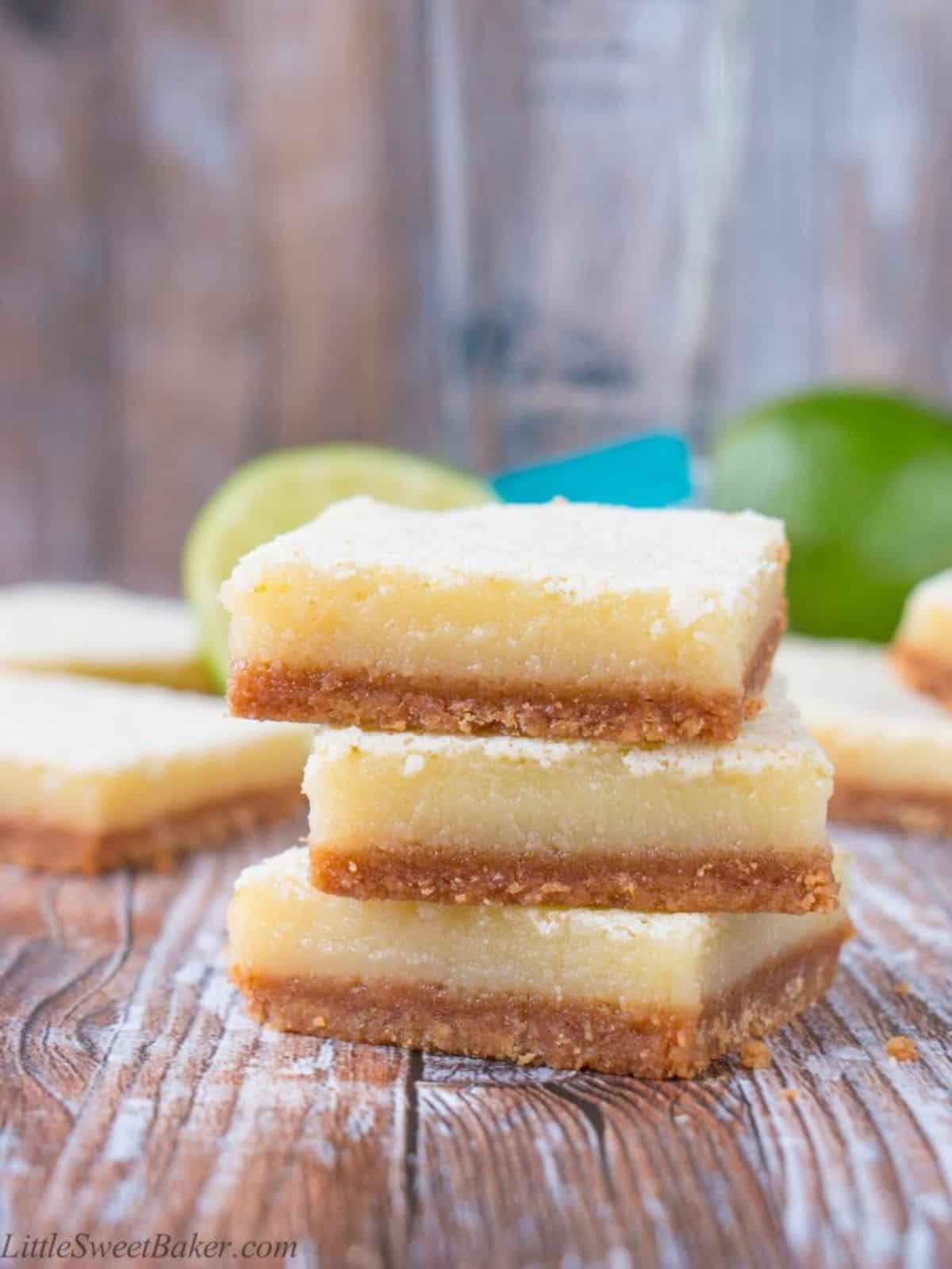 Margarita Lime Bars, showcasing their vibrant lime color and garnished with lime zest, perfect for refreshing lime desserts.