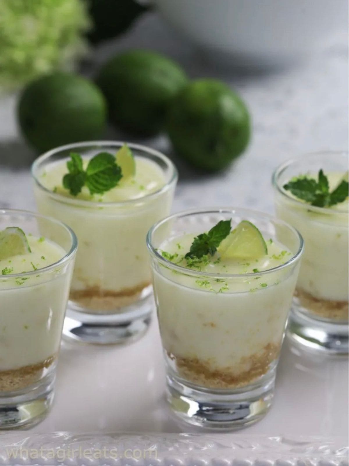 Lime Possets in a glass cup.