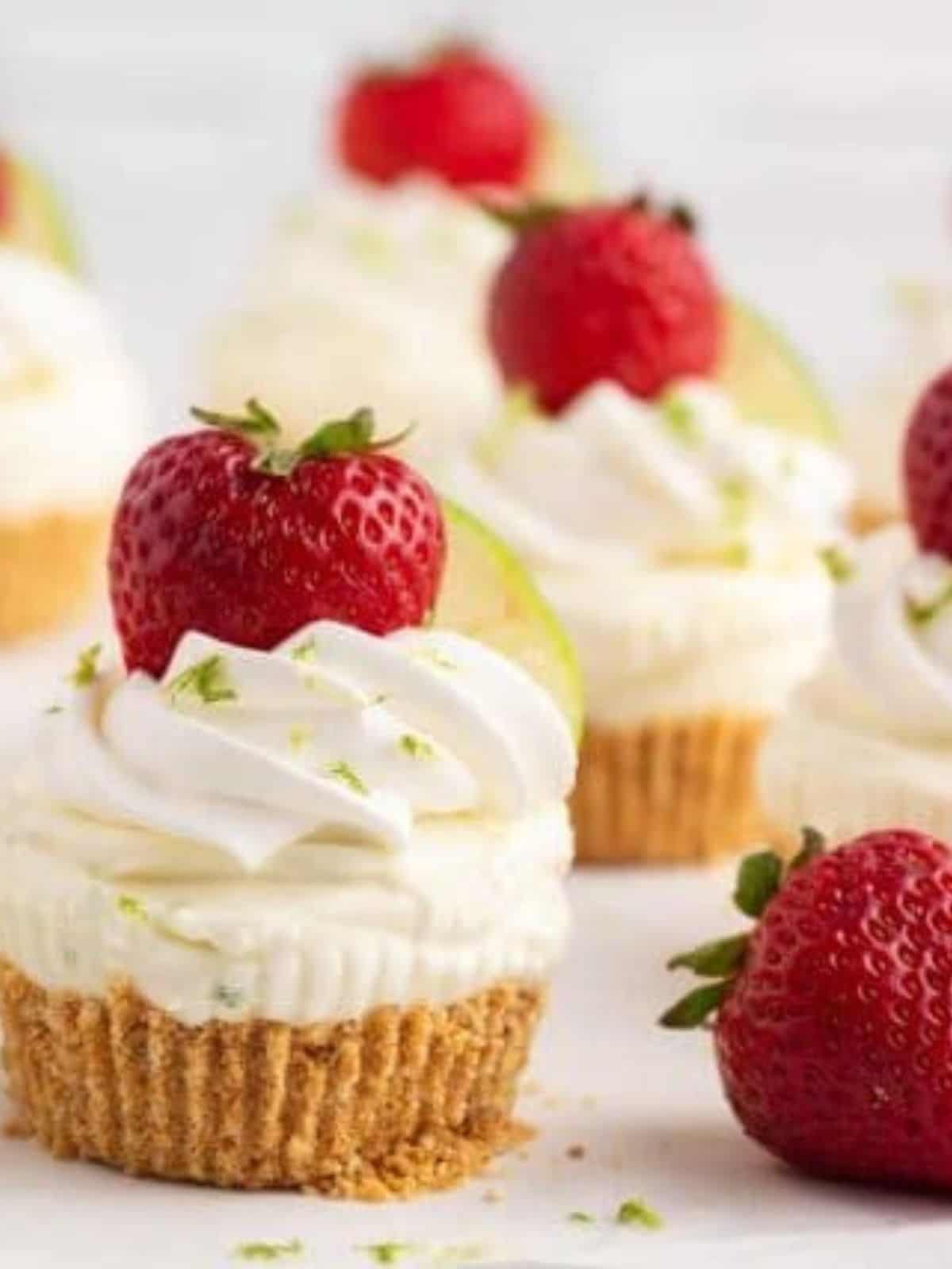 No-Bake Strawberry Lime Cheesecake topped with whole strawberries.