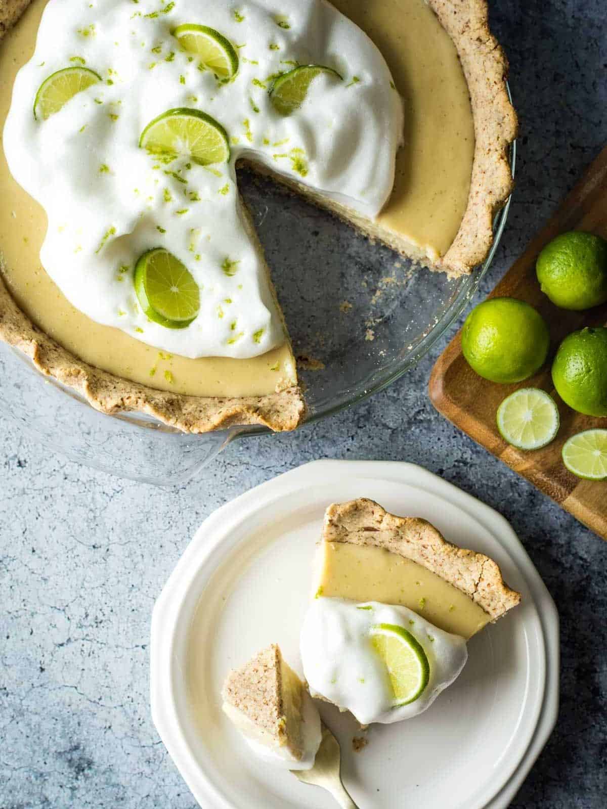 Vegan Key Lime Pie served on a white plate, showcasing a vibrant green filling and a golden crust, ideal for anyone looking for fresh and easy lime dessert recipes.