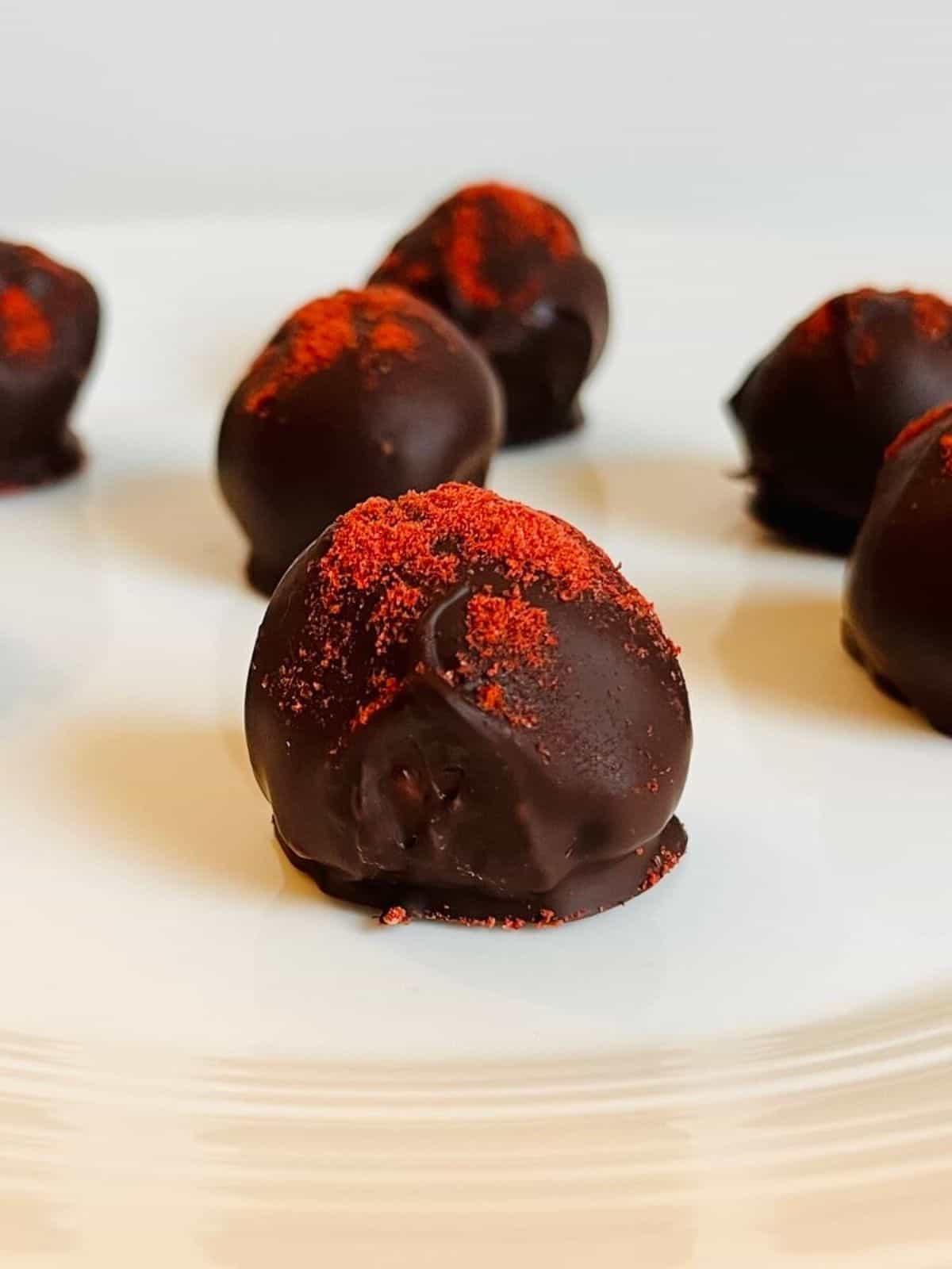 Strawberry Truffles sprinkled with freeze-dried strawberry powder.