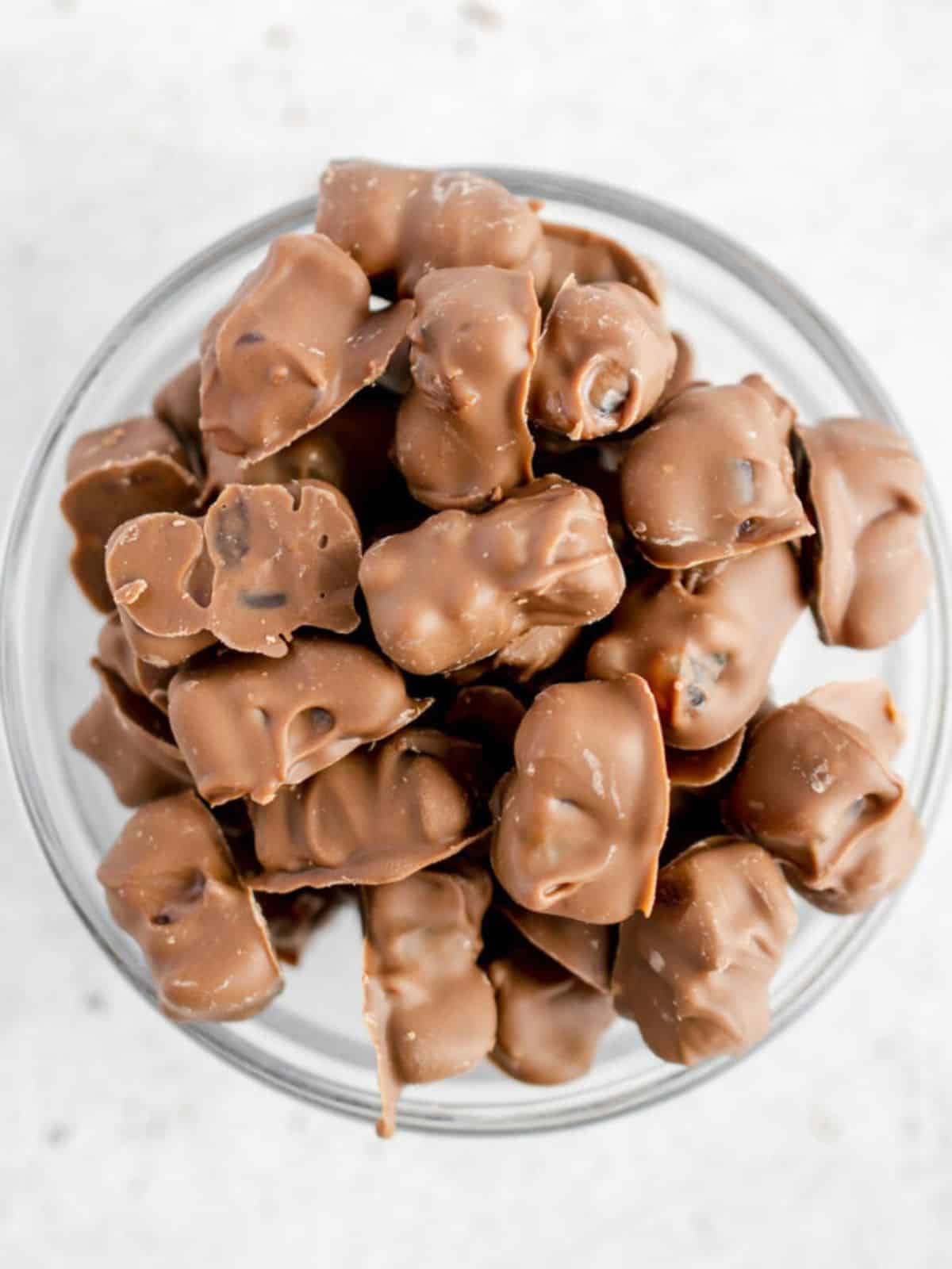 Chocolate Gummy Bears in a glass bowl.