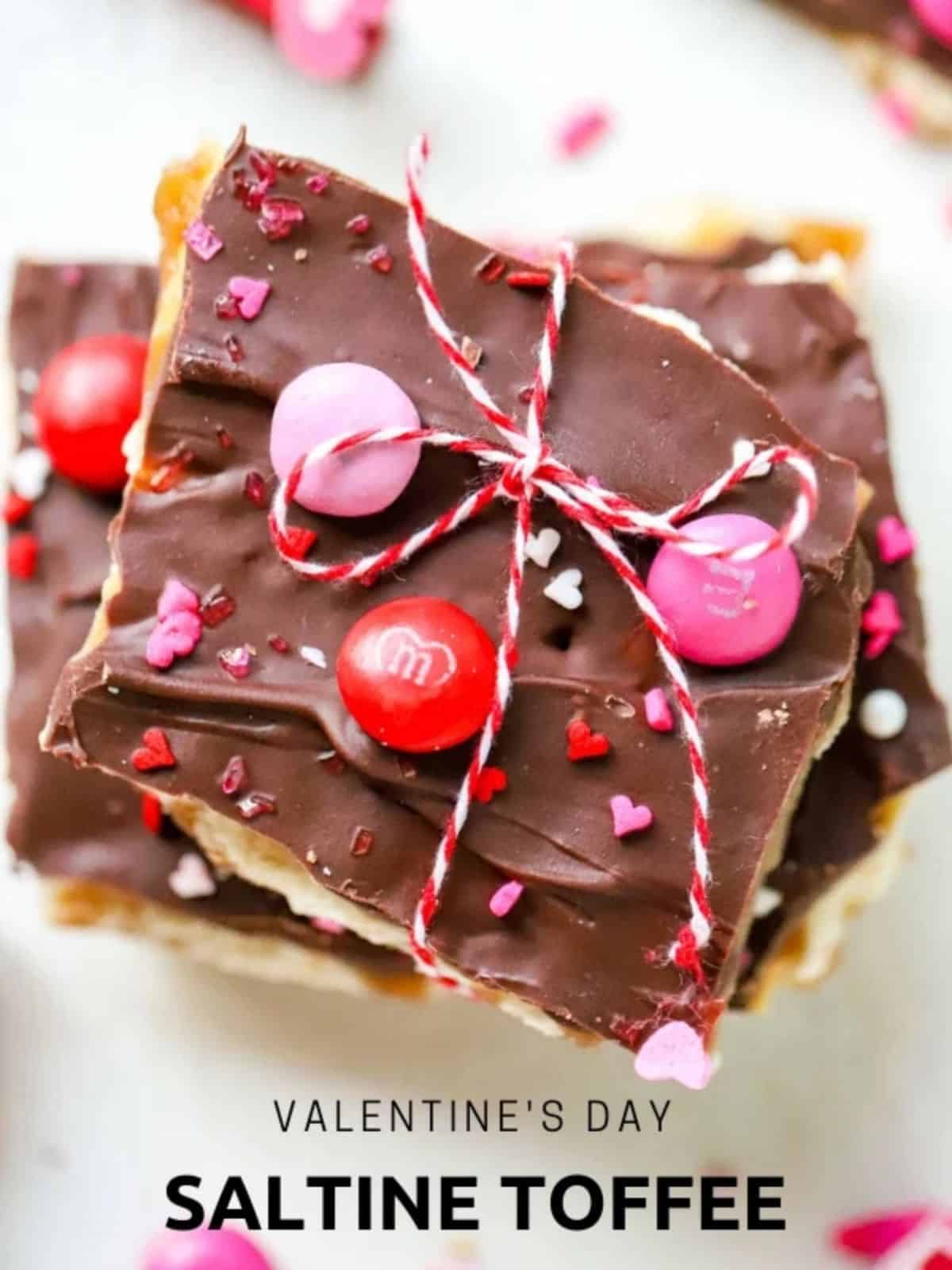 Stacked Dark Chocolate Coated Saltine Crackers with Pink and Red M&Ms
