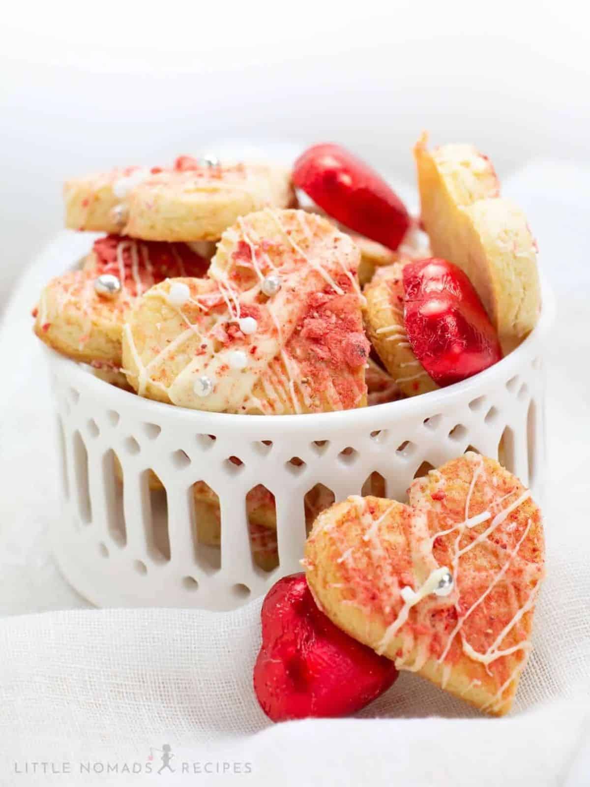 Beautiful strawberry and white chocolate designed heart-shaped butter cookies