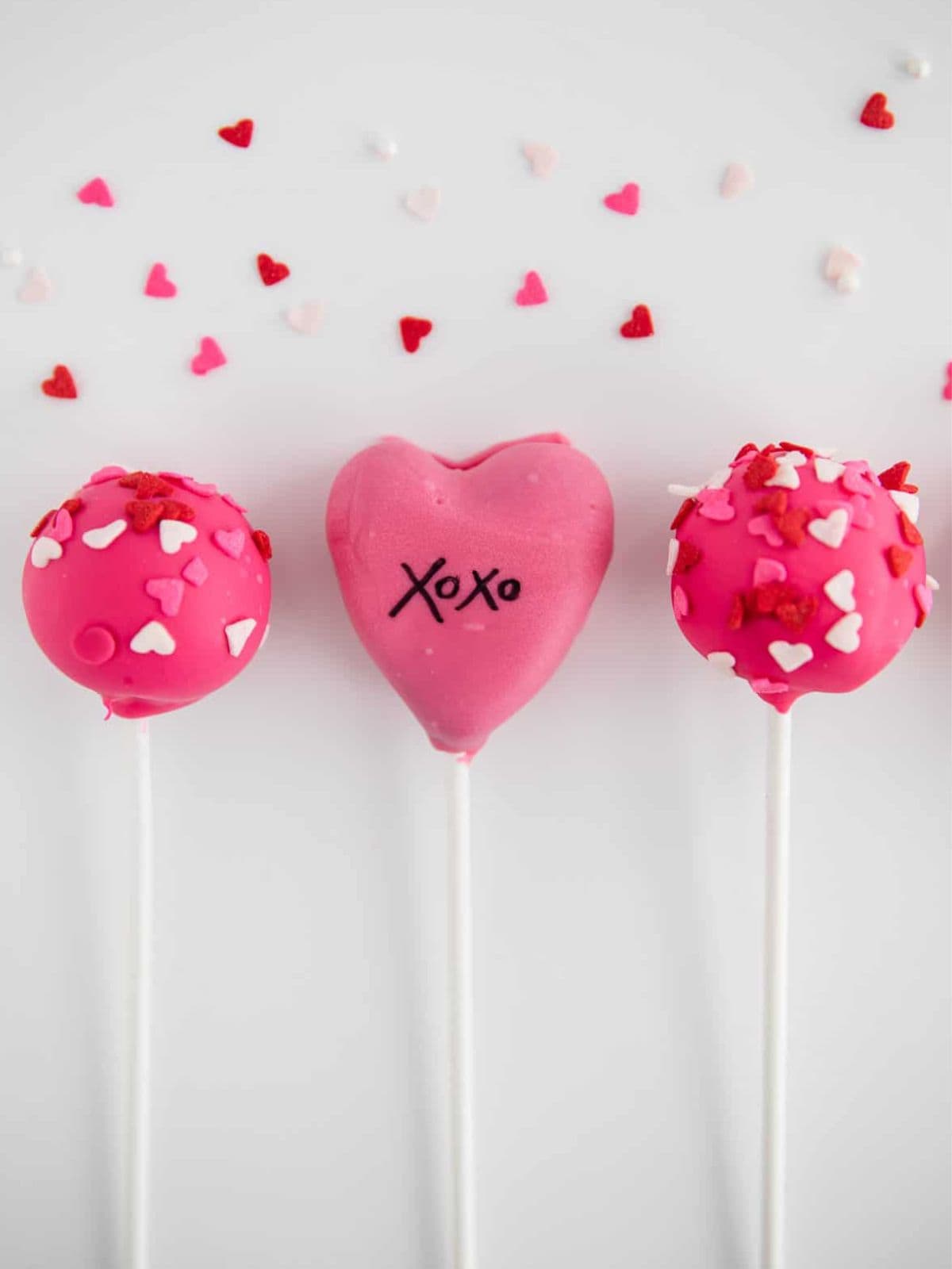 Cute Pink Valentine Cake Pops studded with Pink Confettie Hearts