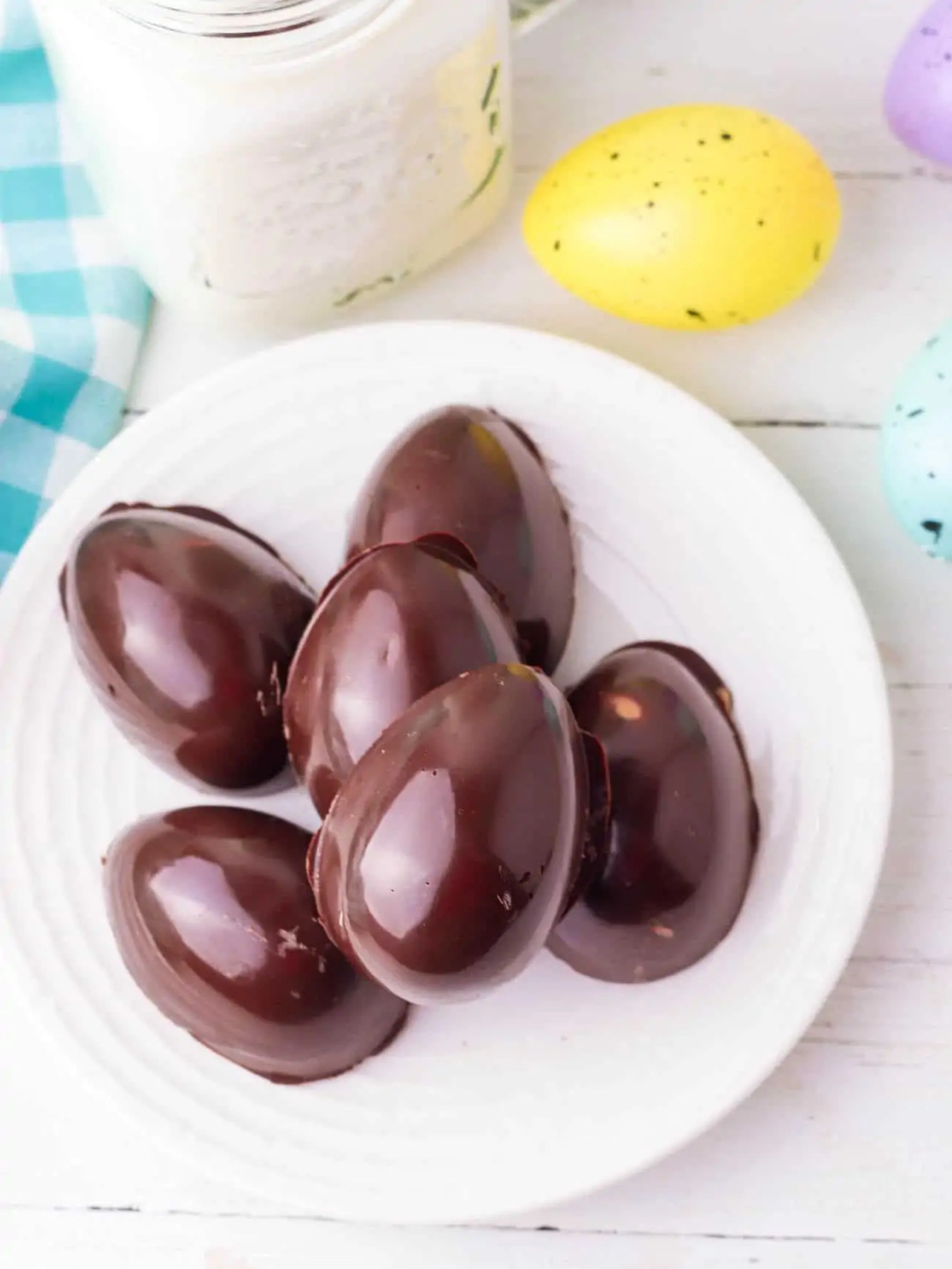 a delightful assortment of chocolate peanut butter eggs, featuring rich chocolate shells filled with creamy peanut butter centers.