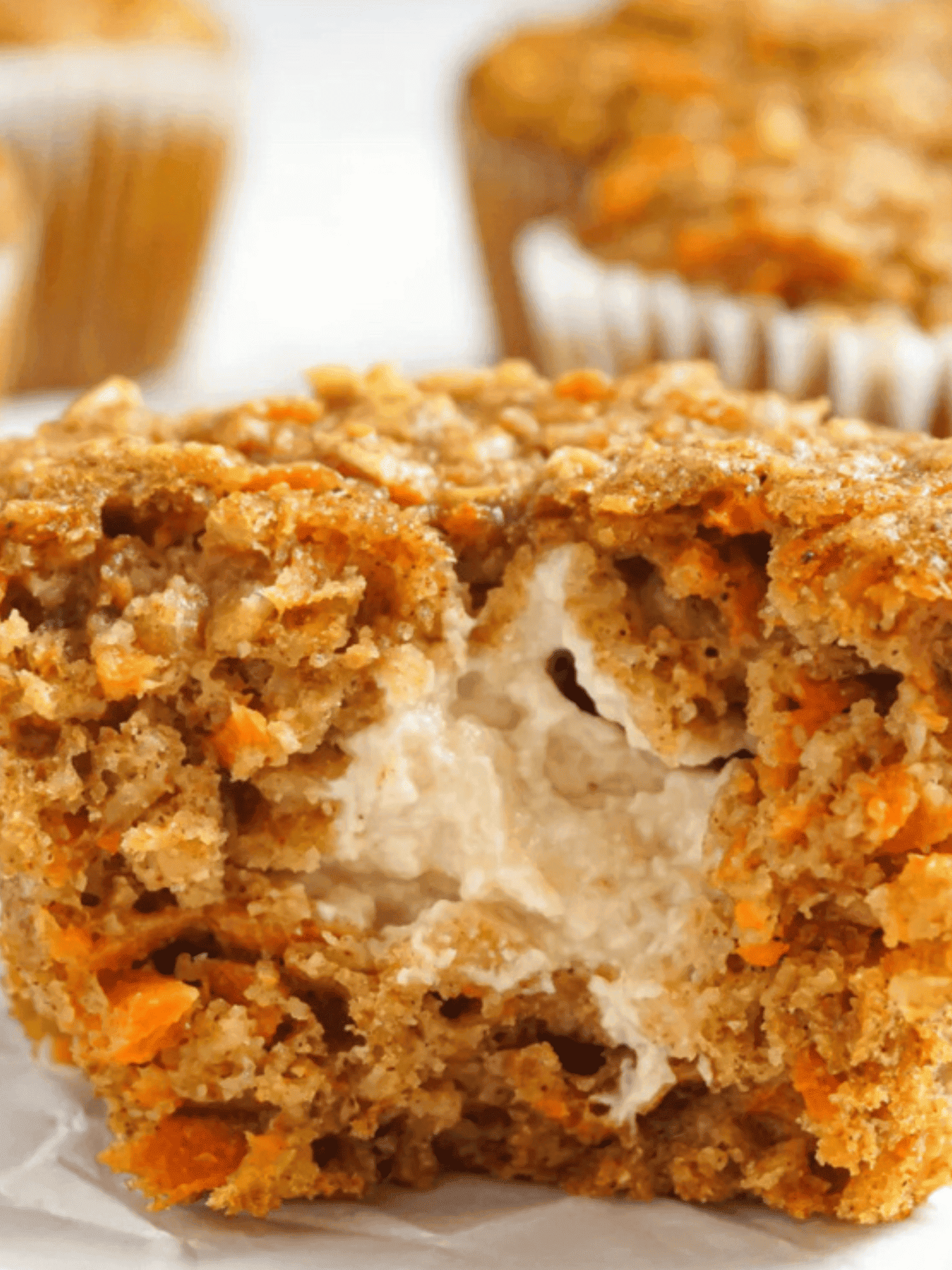 delicious homemade cream cheese-filled carrot muffins.