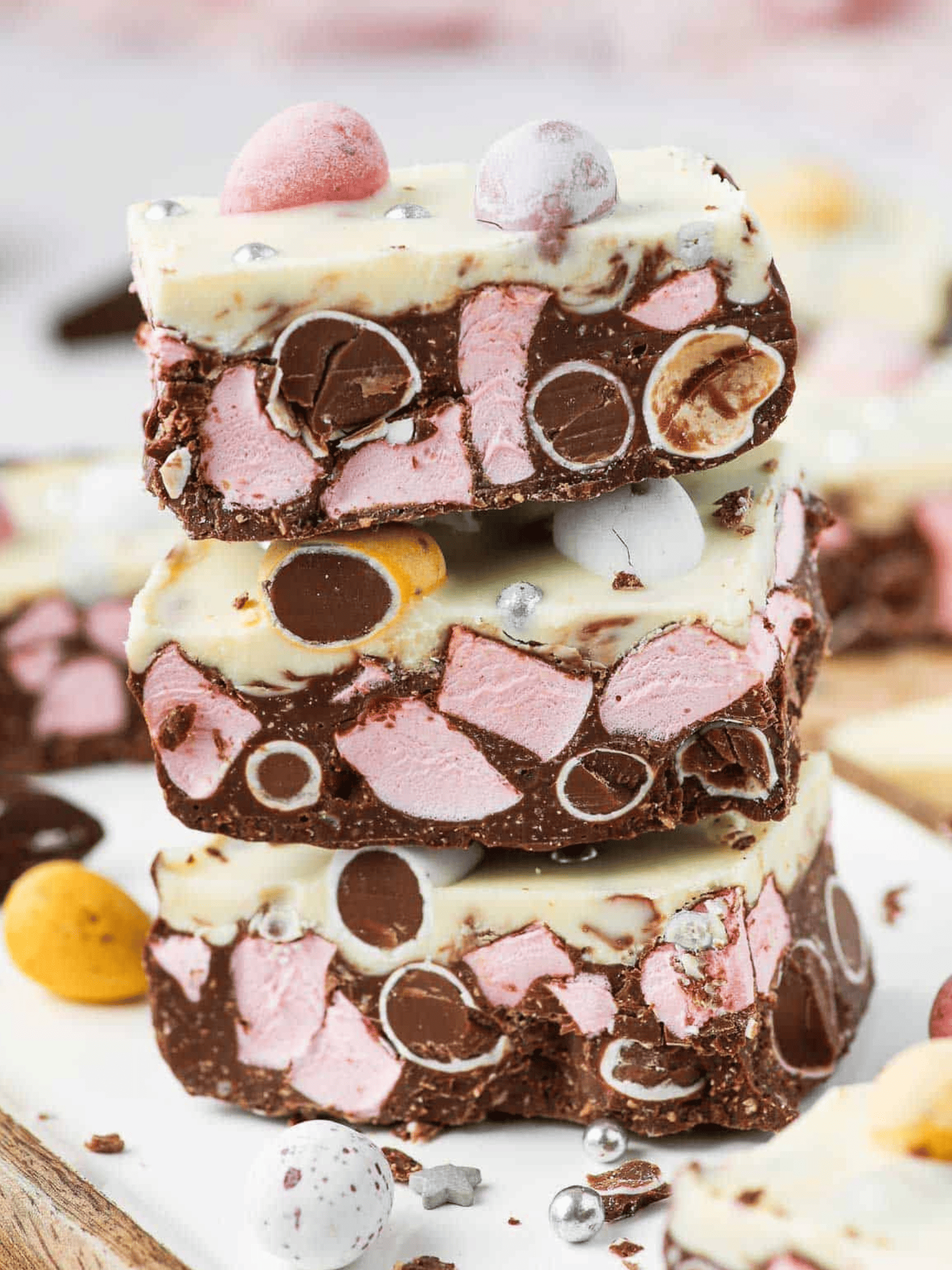 a delicious Easter rocky road slices with a colorful assortment of marshmallows, chocolate, and nuts.