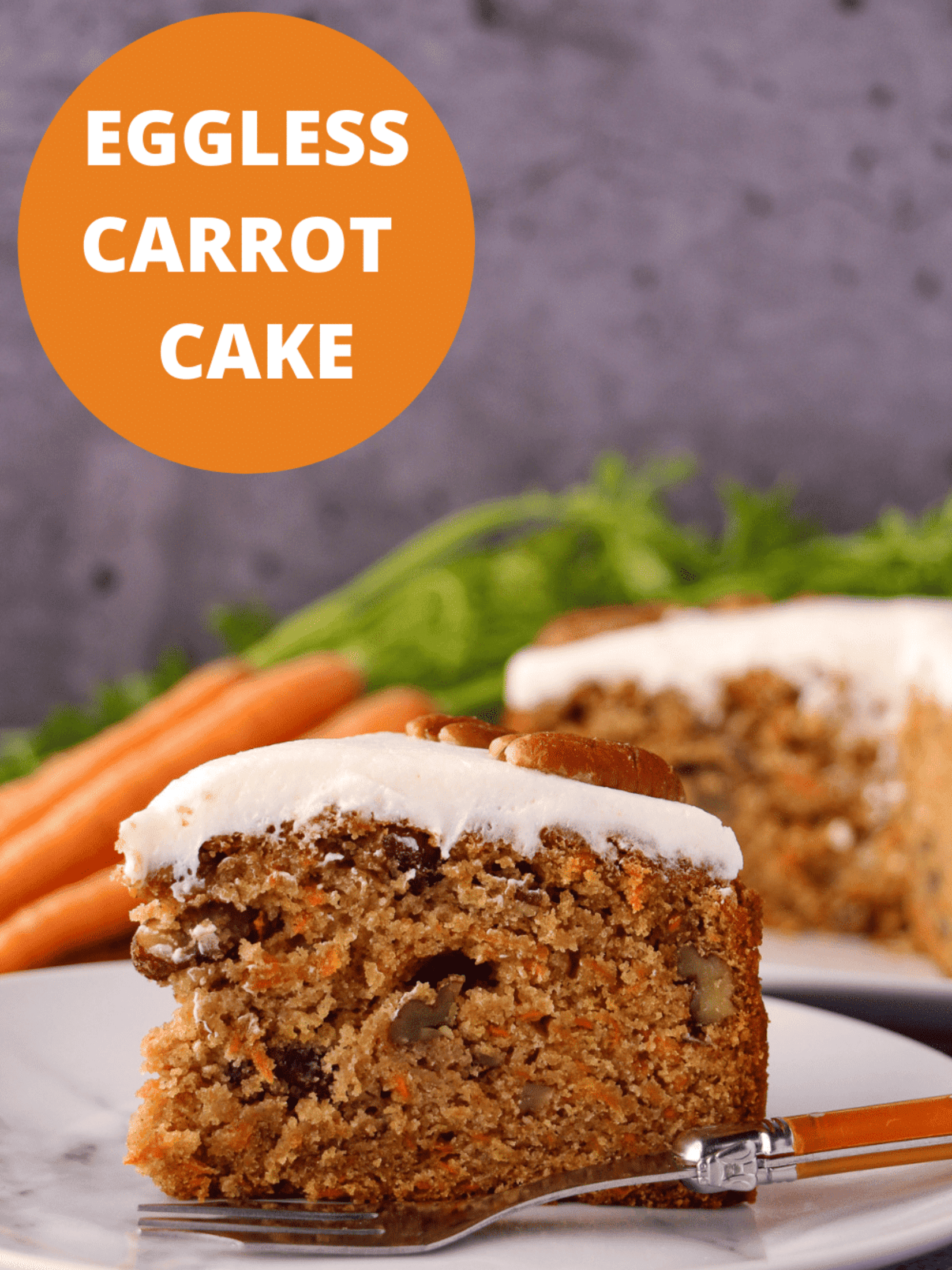 delicious eggless carrot cake topped with creamy frosting.