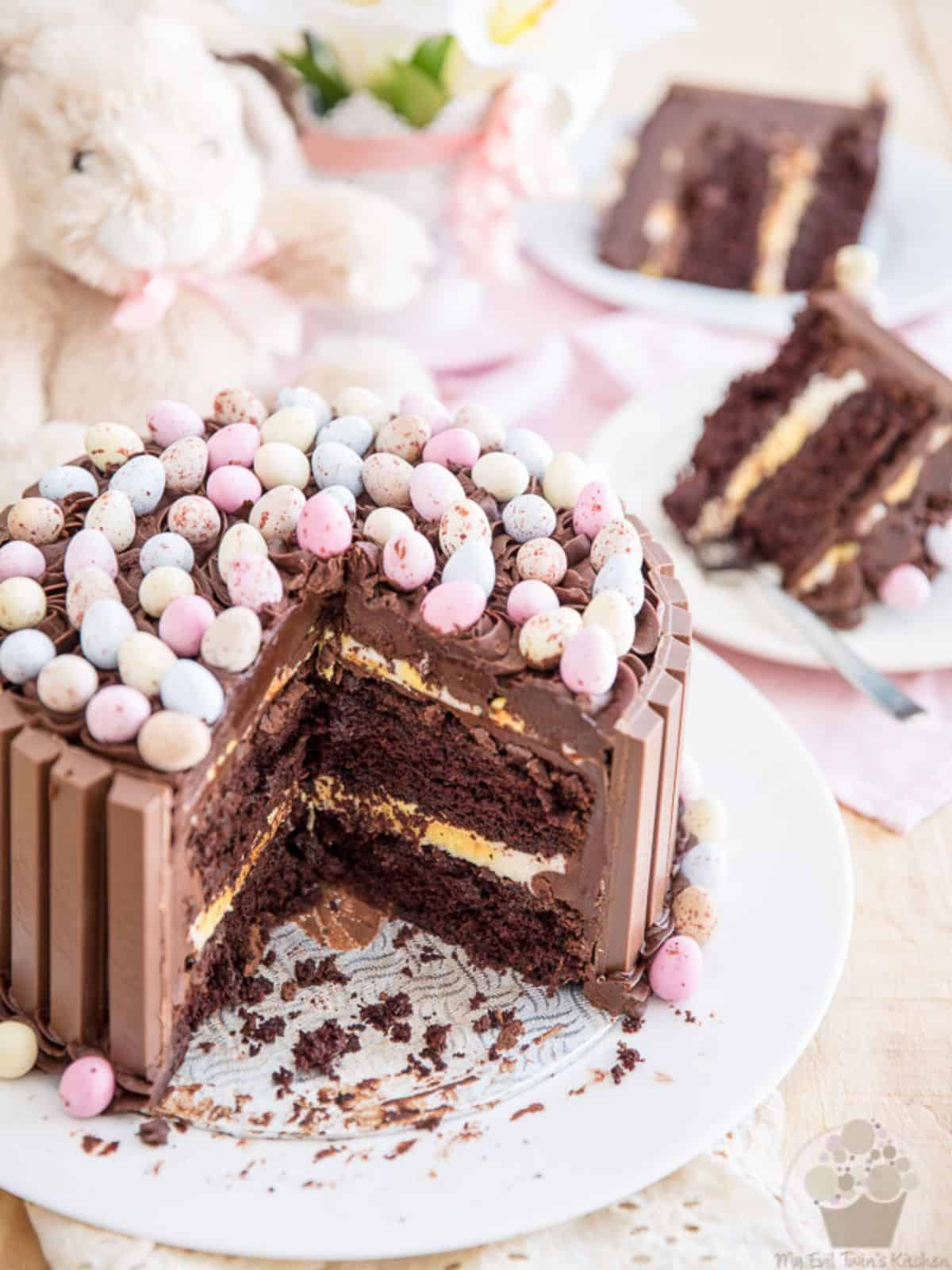 a decadent KitKat cake topped with delightful egg-shaped chocolates.