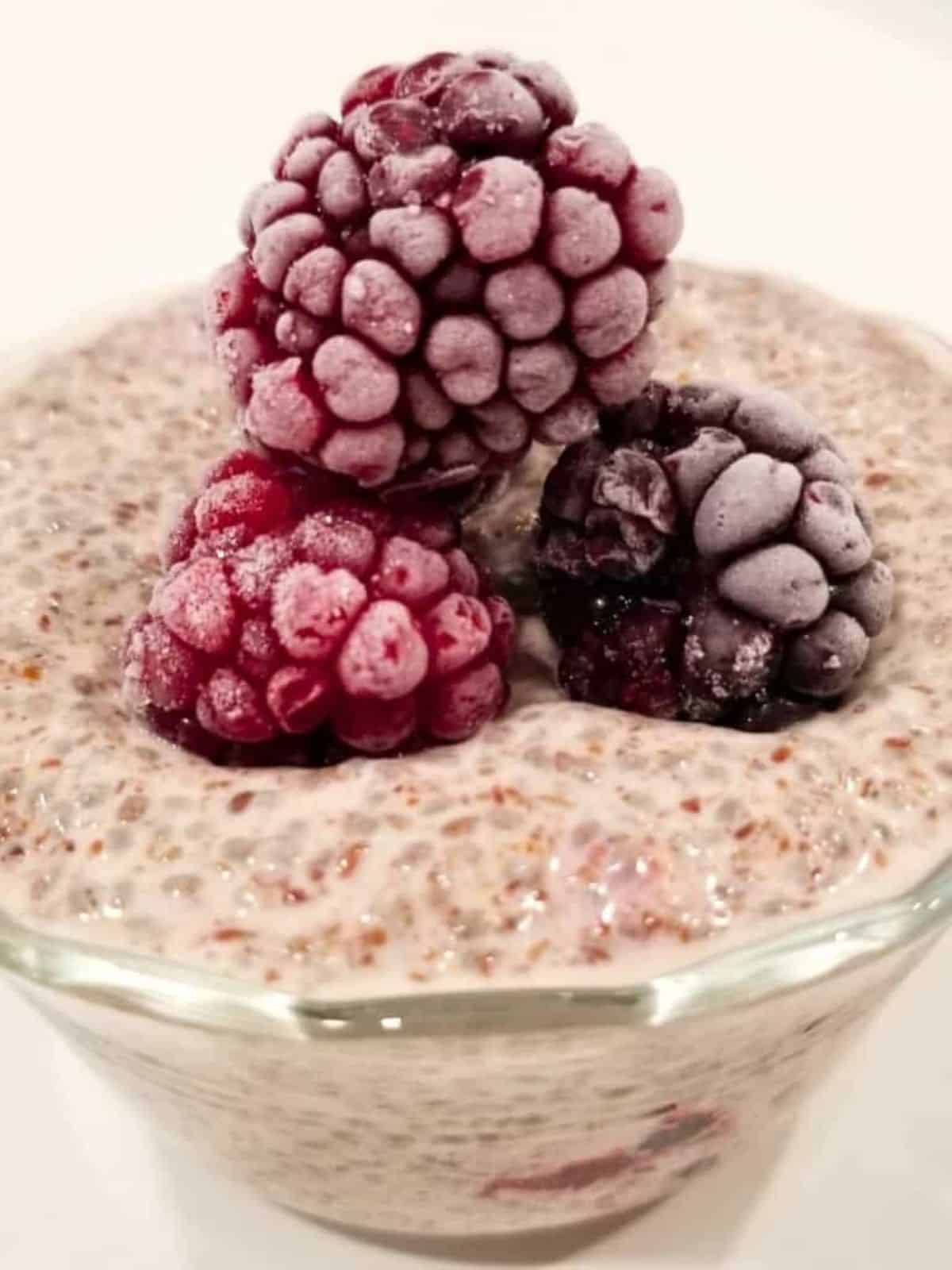 chia and flax seed pudding topped with fresh berries.