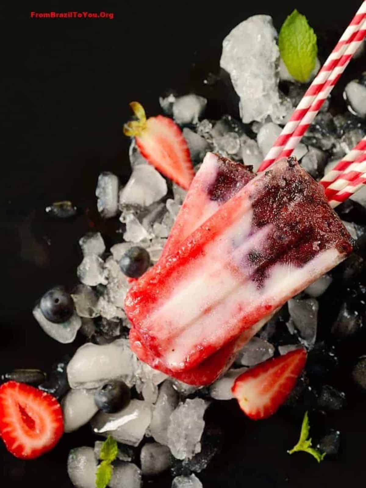 refreshing berry popsicles made with coconut and creamy yogurt.