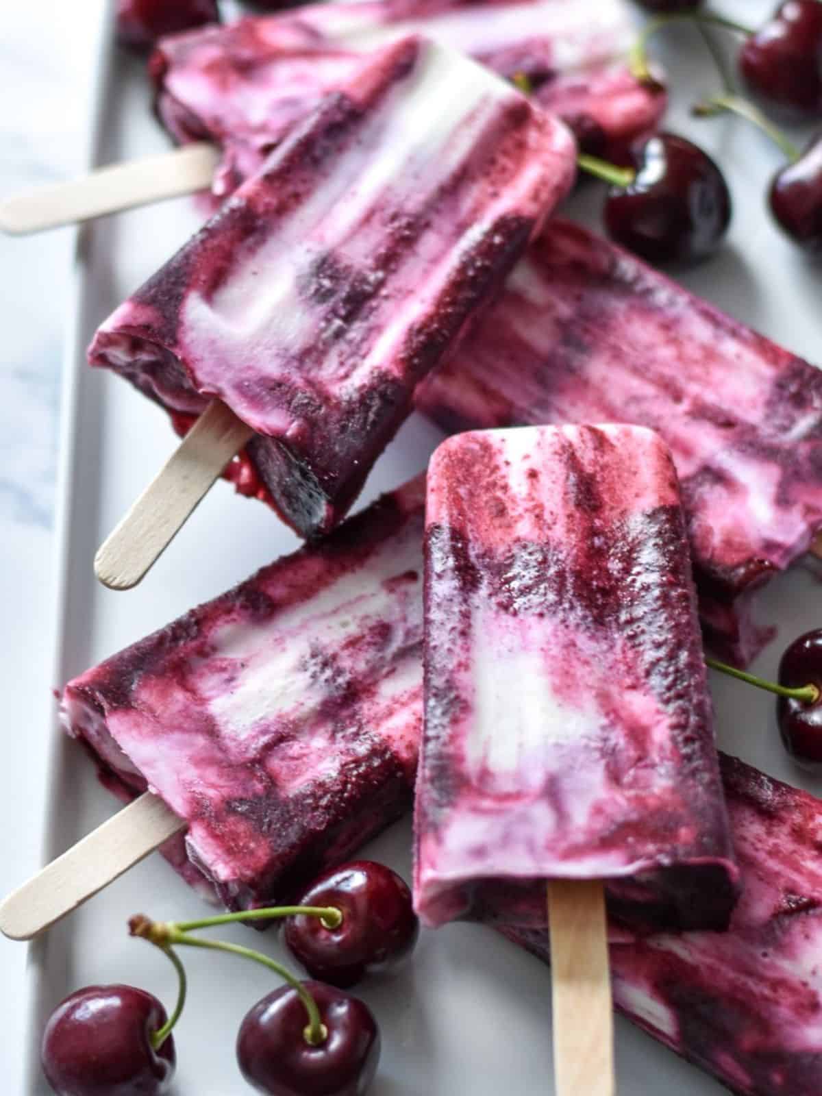 homemade cherry goat cheese paletas made with frozen cherries and goat cheese.