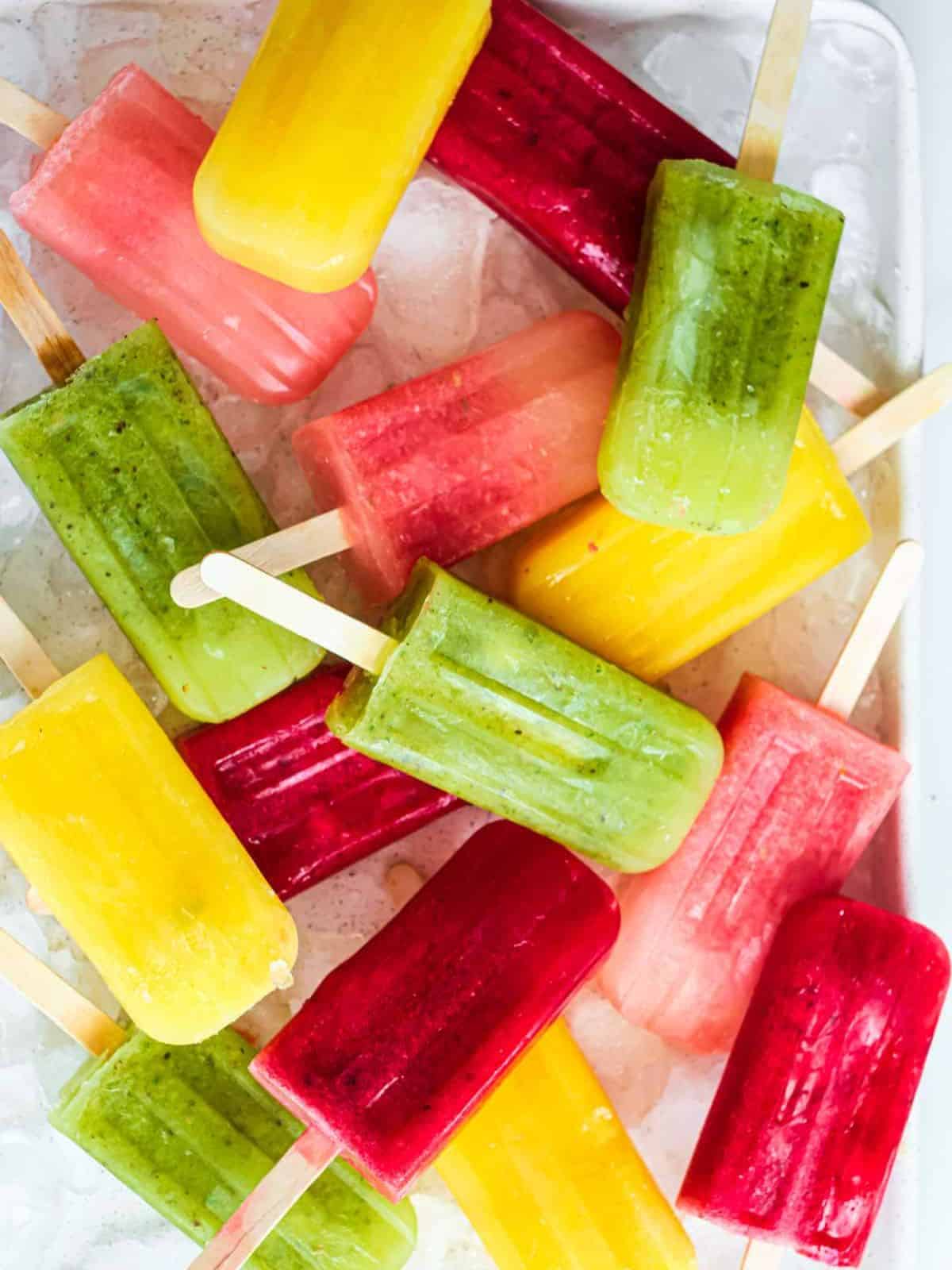 colorful and refreshing Mexican fruit paletas made with different kinds of fruits.