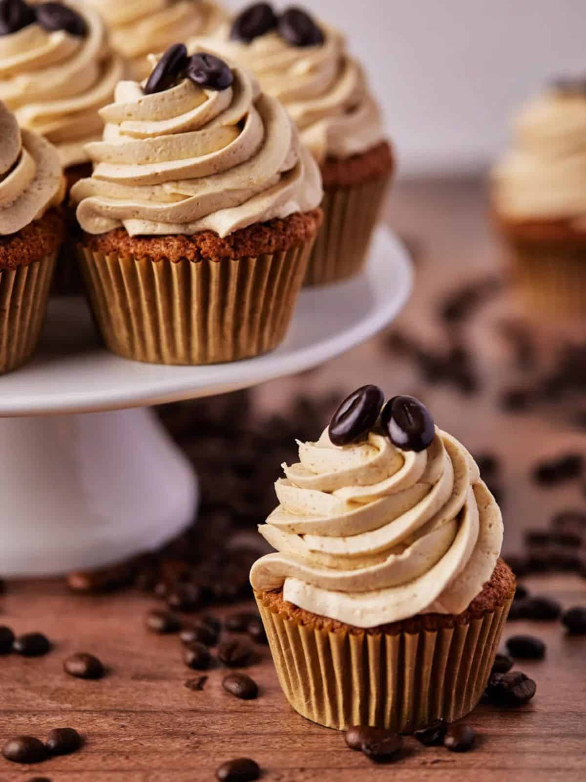 coffee cupcakes featuring the fluffy coffee-infused sponge topped with smooth coffee buttercream.