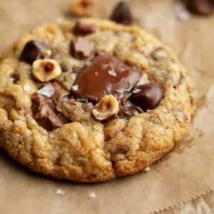 Nutella chocolate chip cookies filled with Nutella spread and topped with homemade Nutella chips.