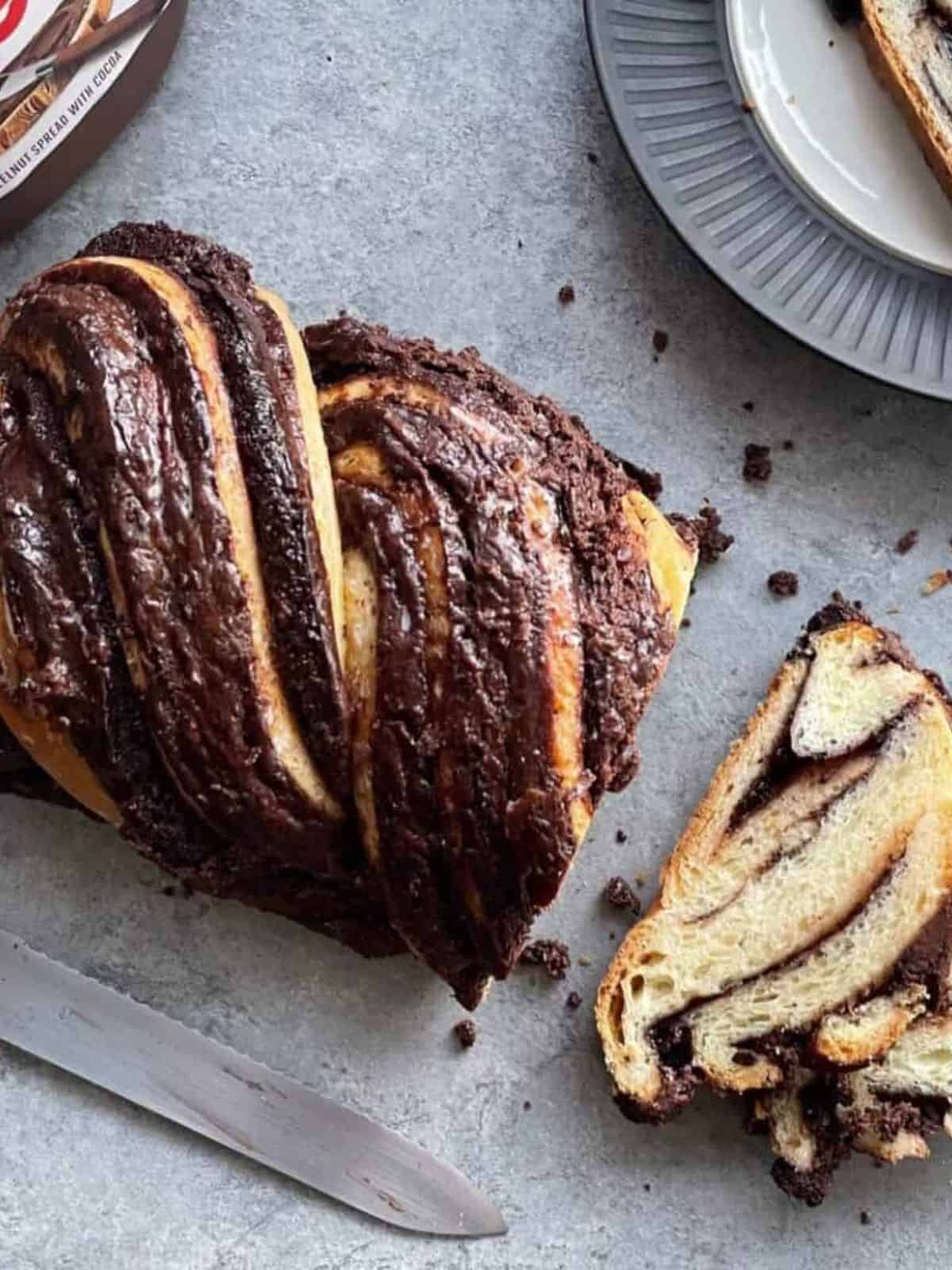 Nutella babka made with a buttery brioche dough wrapped around a smooth chocolate and hazelnut filling.