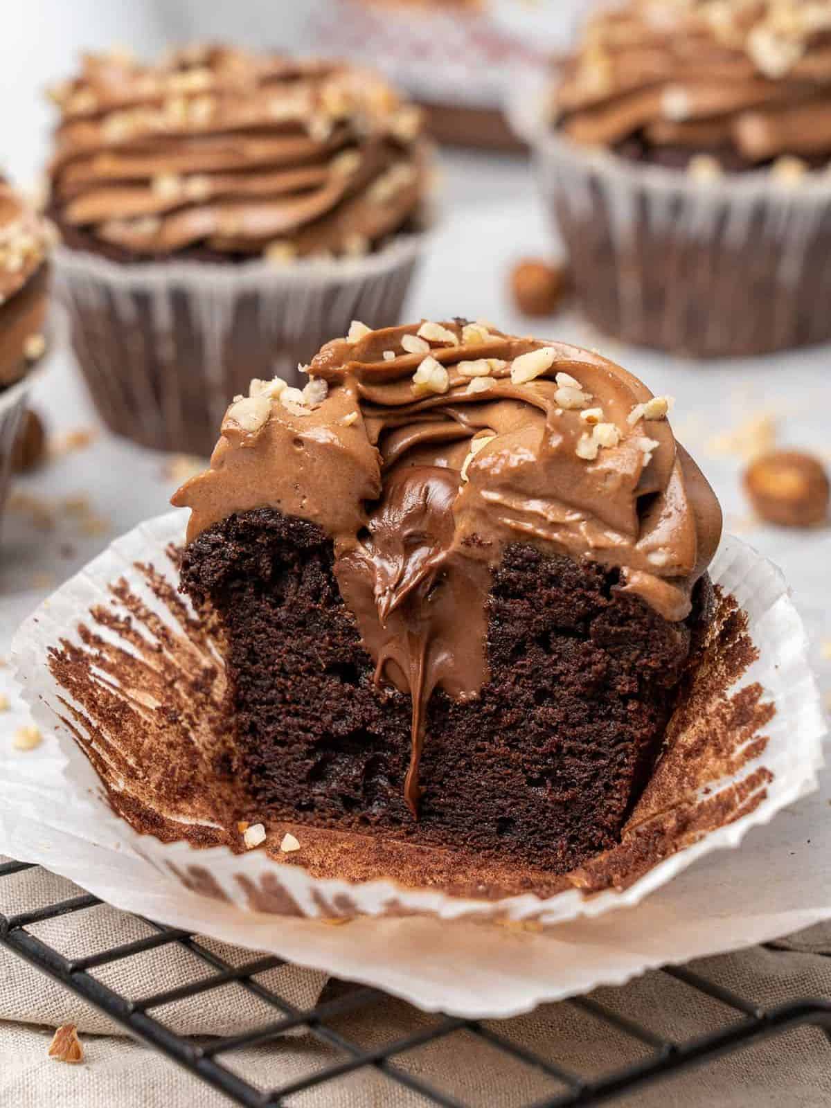 a decadent Nutella cupcakes featuring a moist cake covered with creamy Nutella spread.