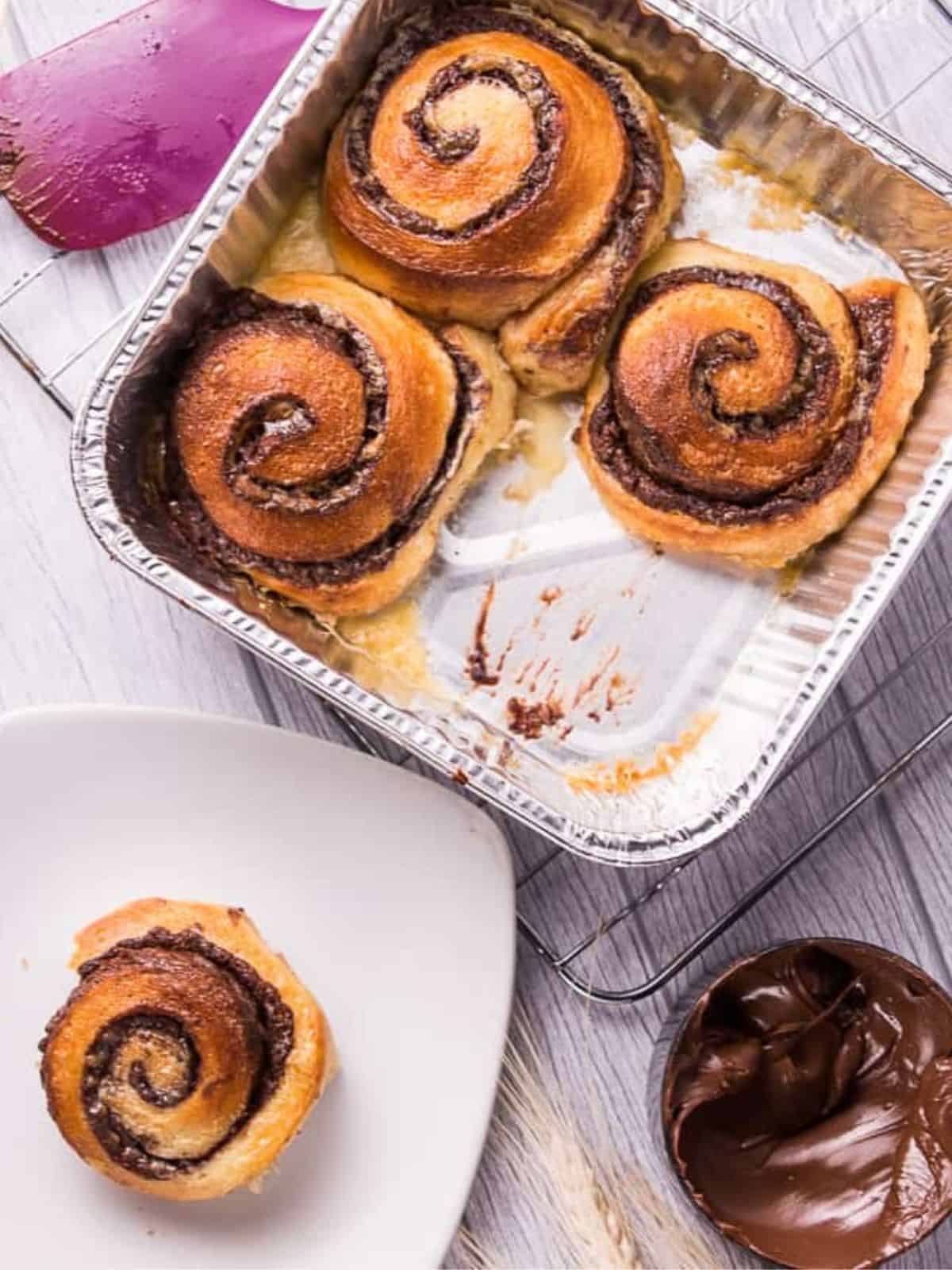 Nutella roll buns made with soft and moist buns with a creamy Nutella filling inside.