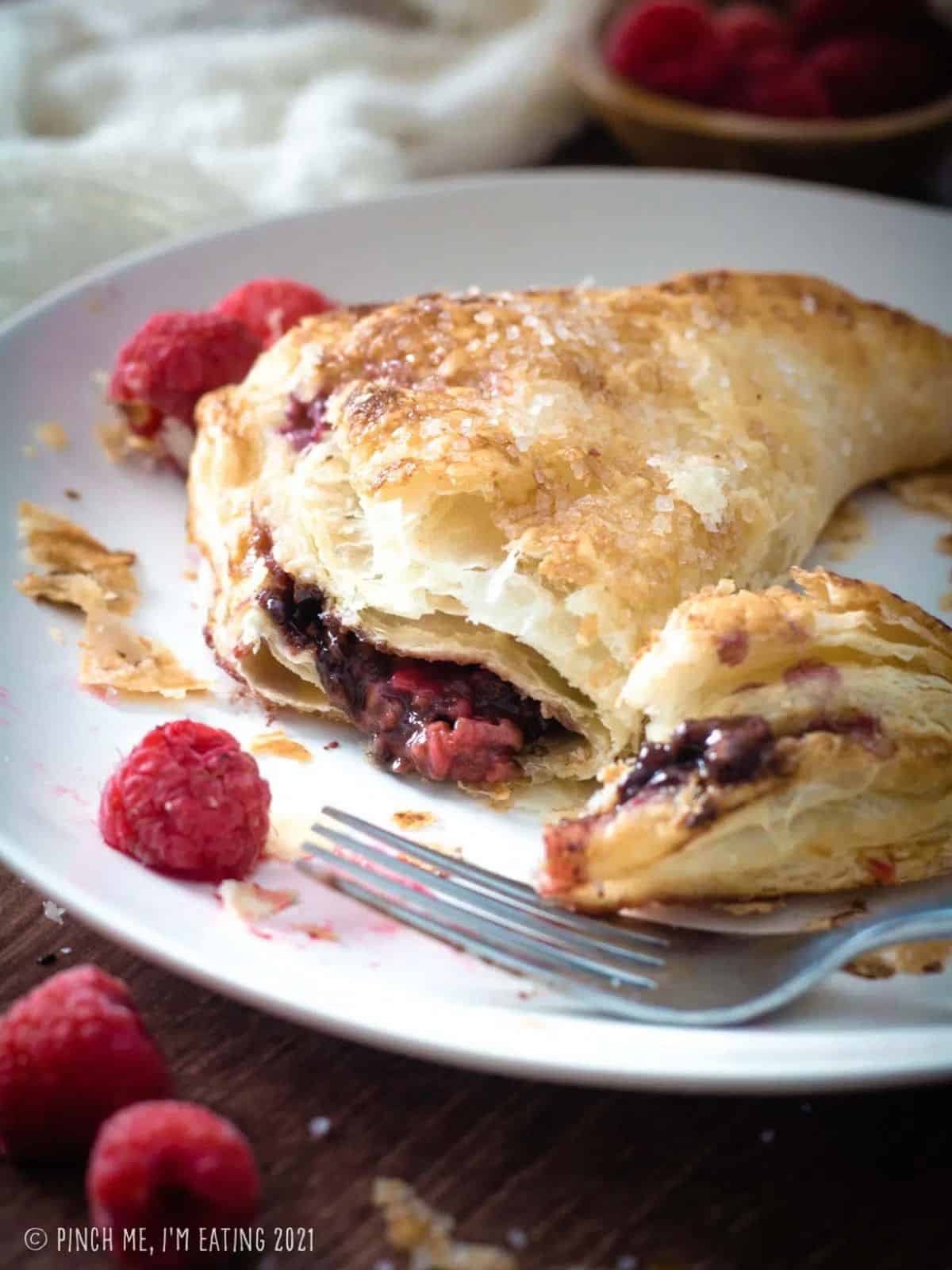 raspberry Nutella turnovers made with frozen puff pastry.