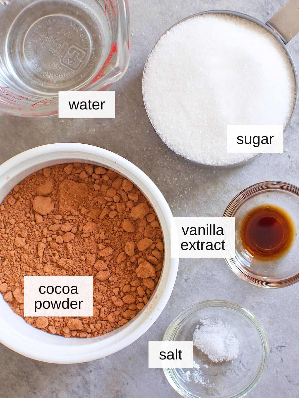 ingredients for chocolate syrup, including water, sugar, cocoa powder, vanilla extract, and salt.