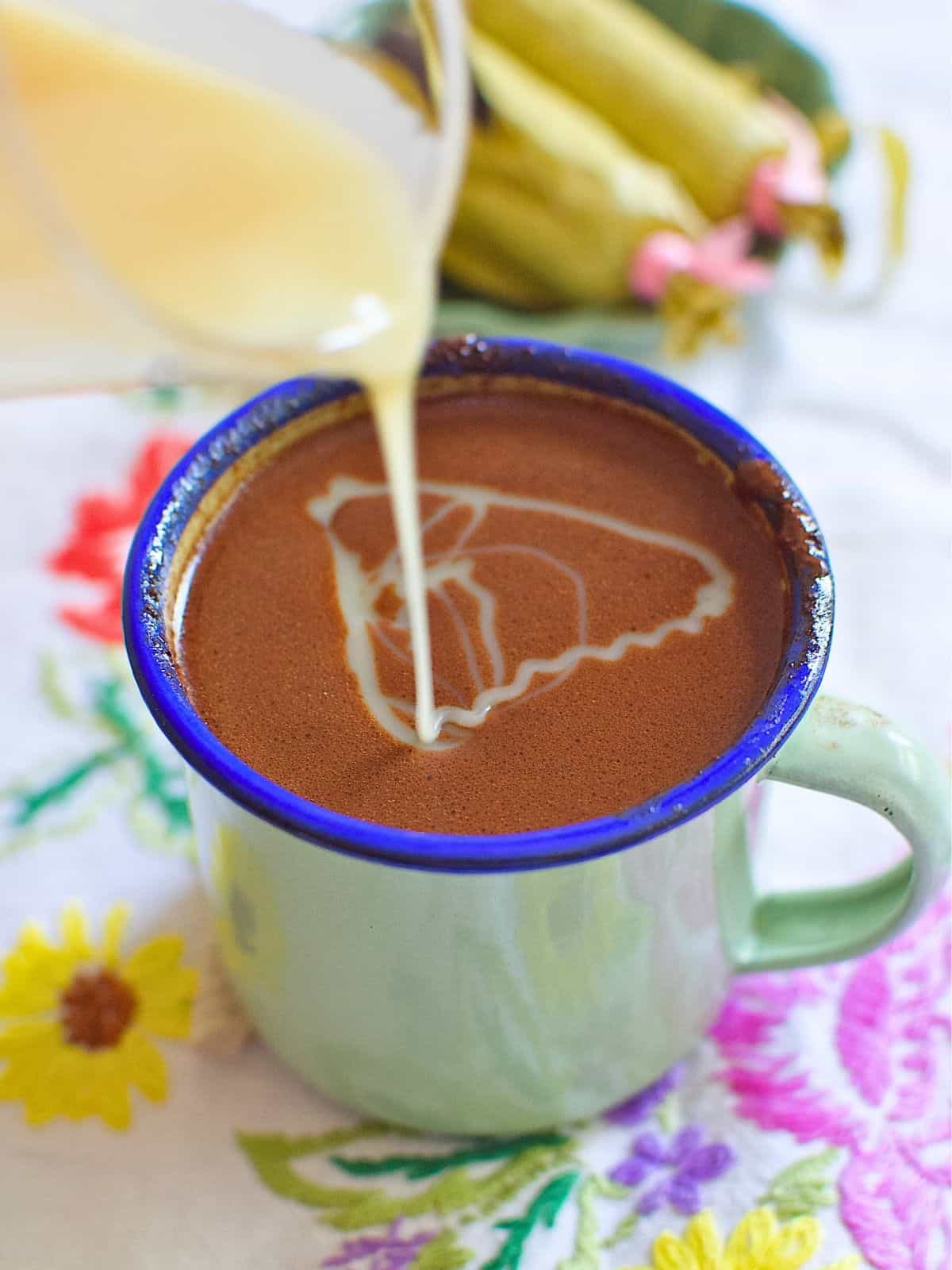 hot chocolate (sikwate) with additional condensed milk in a mug.