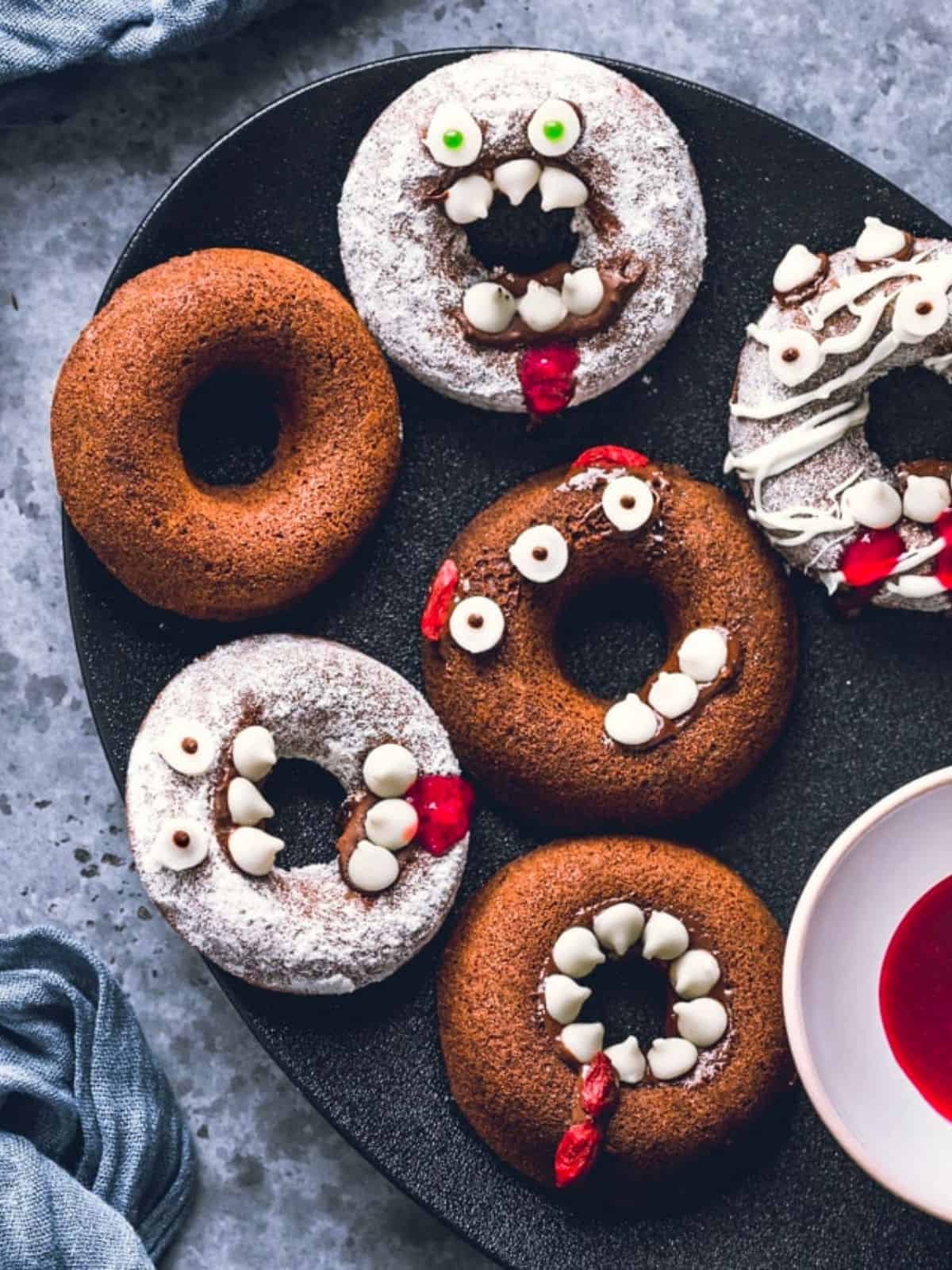 Monster designed Halloween themed donuts.