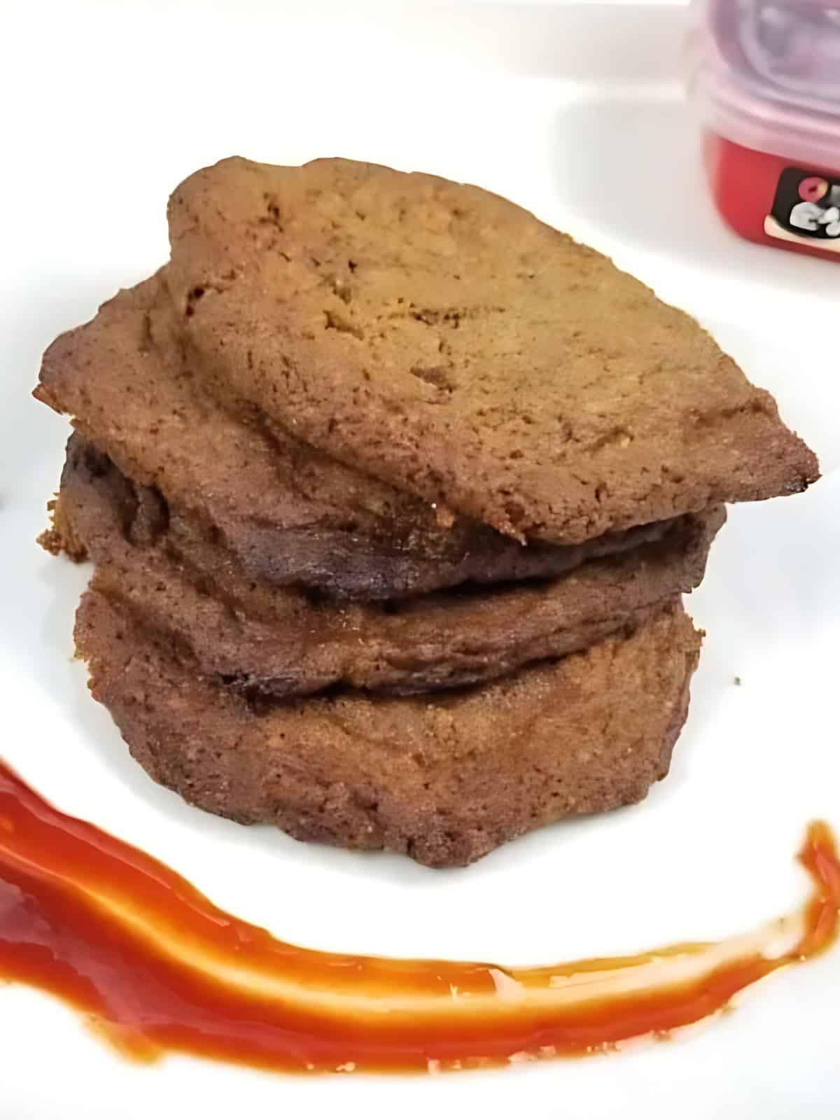 Stacks of chewy gochujang caramel cookies.