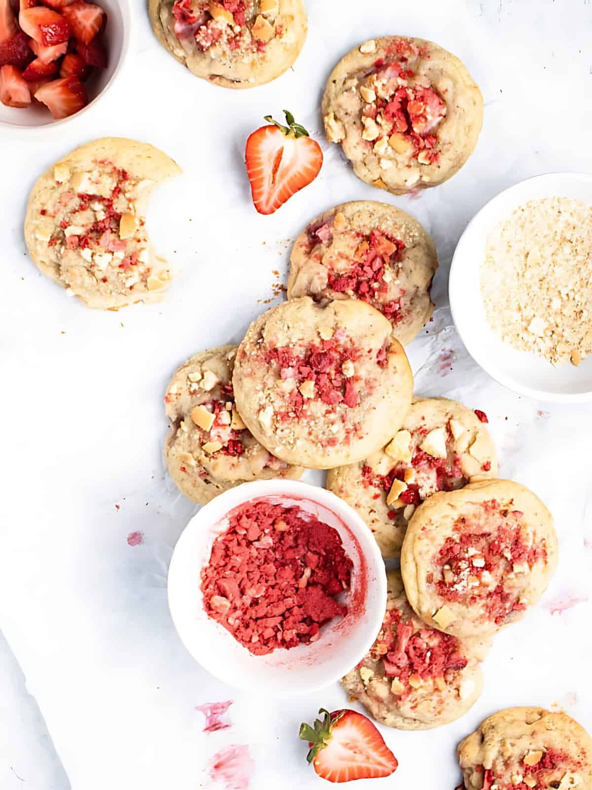Strawberry Shortcake cookies with sliced strawberries topped with strawberry flavored bits.
