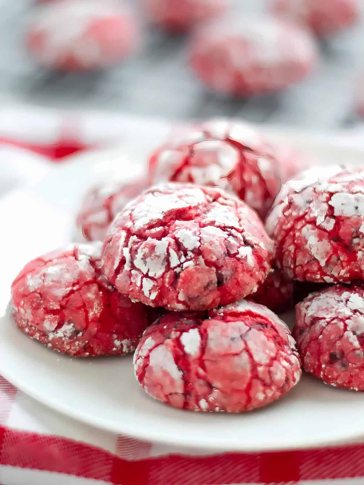 A plate of cherry flavored chocolate chip crinkles.