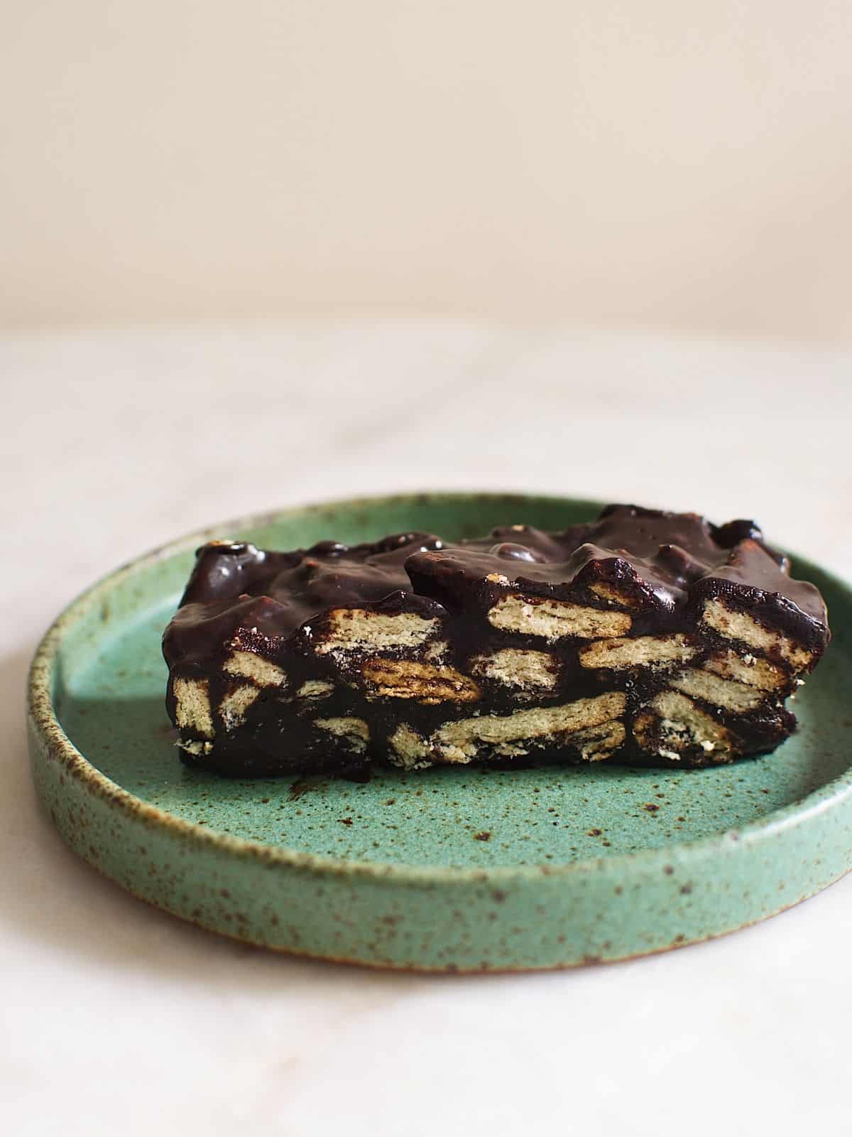 A piece of chocolate lazy cake in a plate.