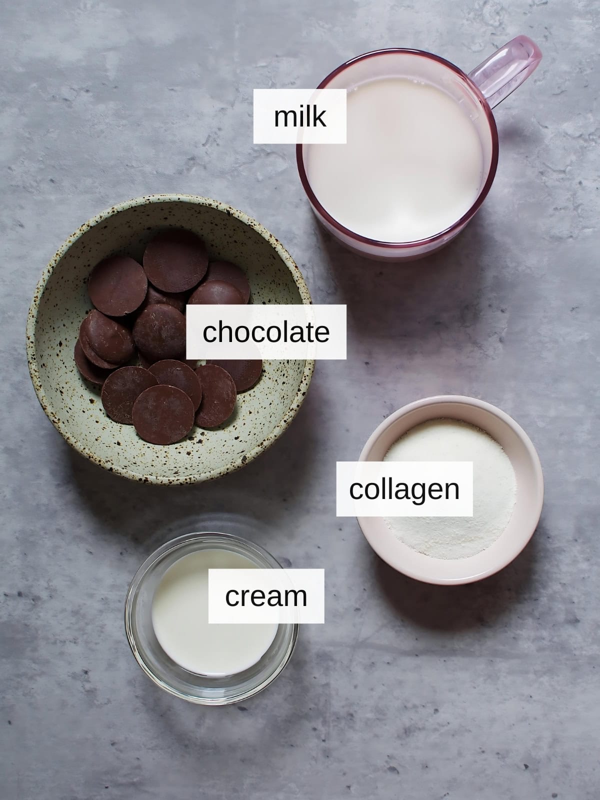 Collagen hot chocolate recipe ingredients with milk, chocolate, collagen, and cream