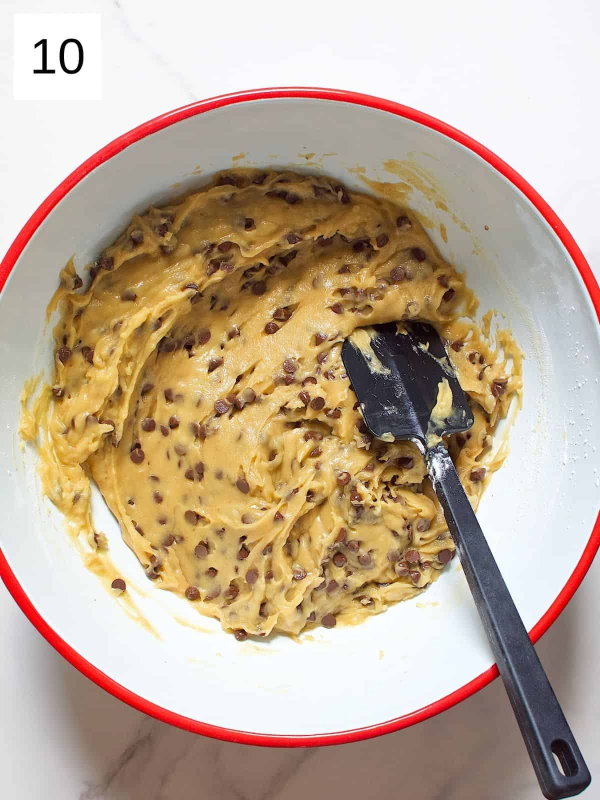 Maple syrup chocolate chip cookie dough in a bowl.