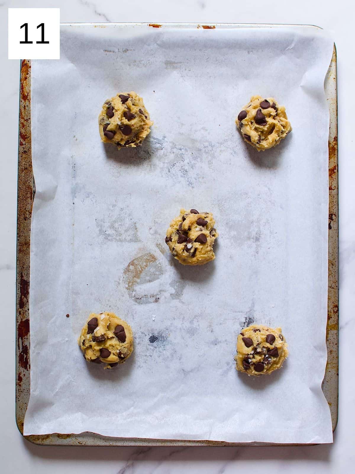 Maple syrup chocolate chip cookie dough in a baking tray.