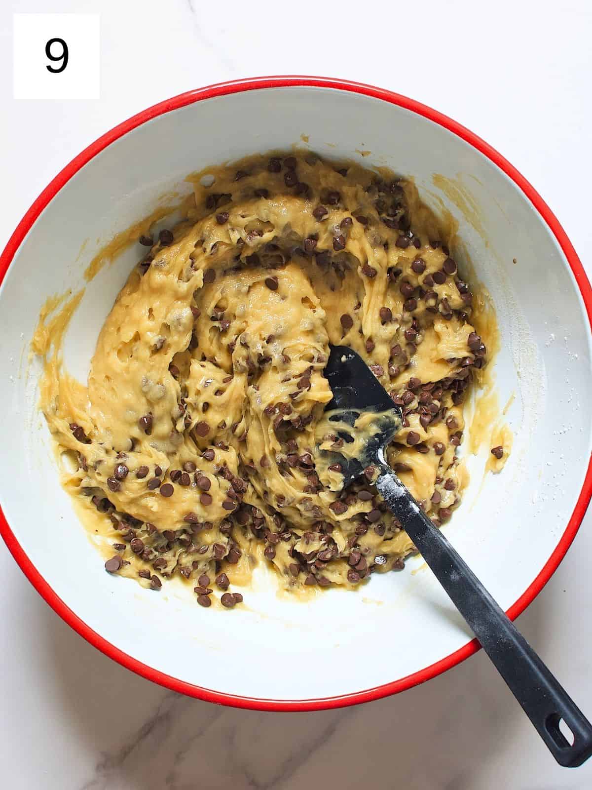 Maple syrup cookie dough being mixed in a bowl.