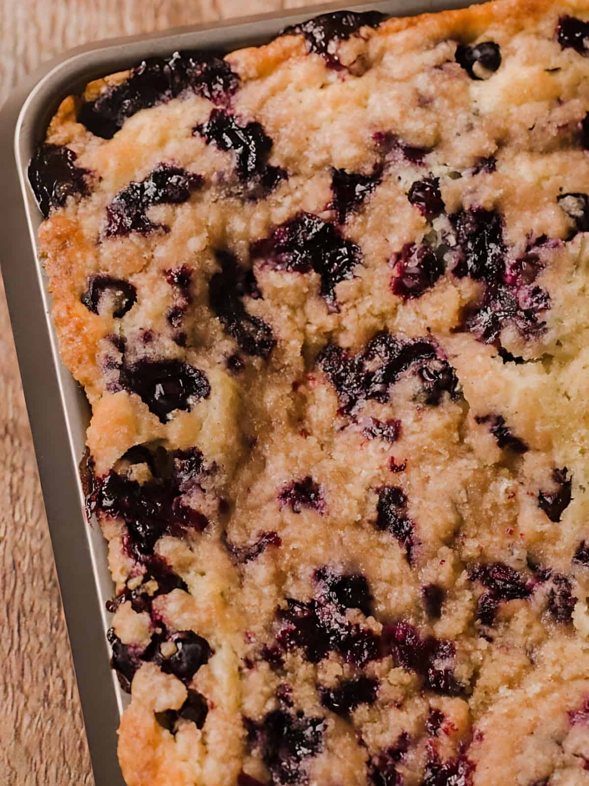 Blueberry filled buckle in a tray.