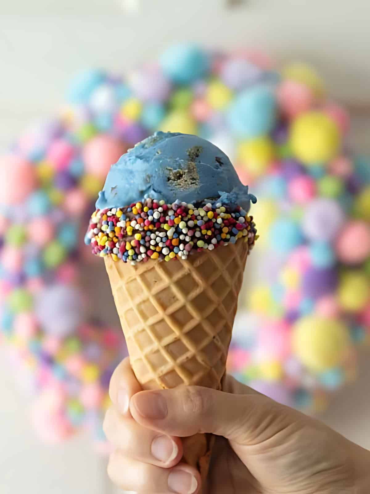 Cookie monster themed ice cream with sprinkles.