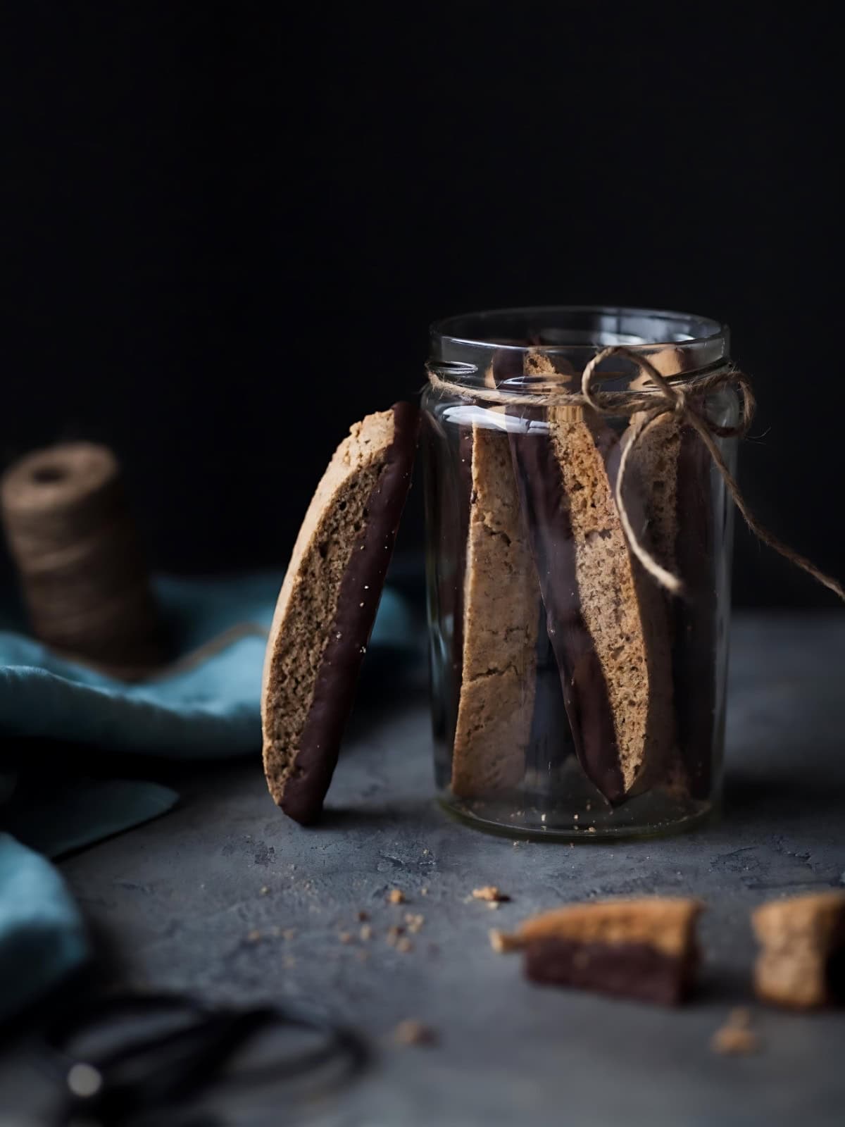 A jar of chocolate olive oil biscott.